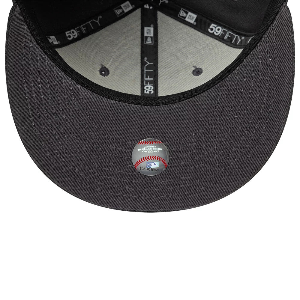 New York Yankees Essential Grey New Era 59FIFTY Fitted Cap, inside view showing grey taping with 59FIFTY branding, a grey undervisor, and an MLB authentication sticker on the underside of the visor.