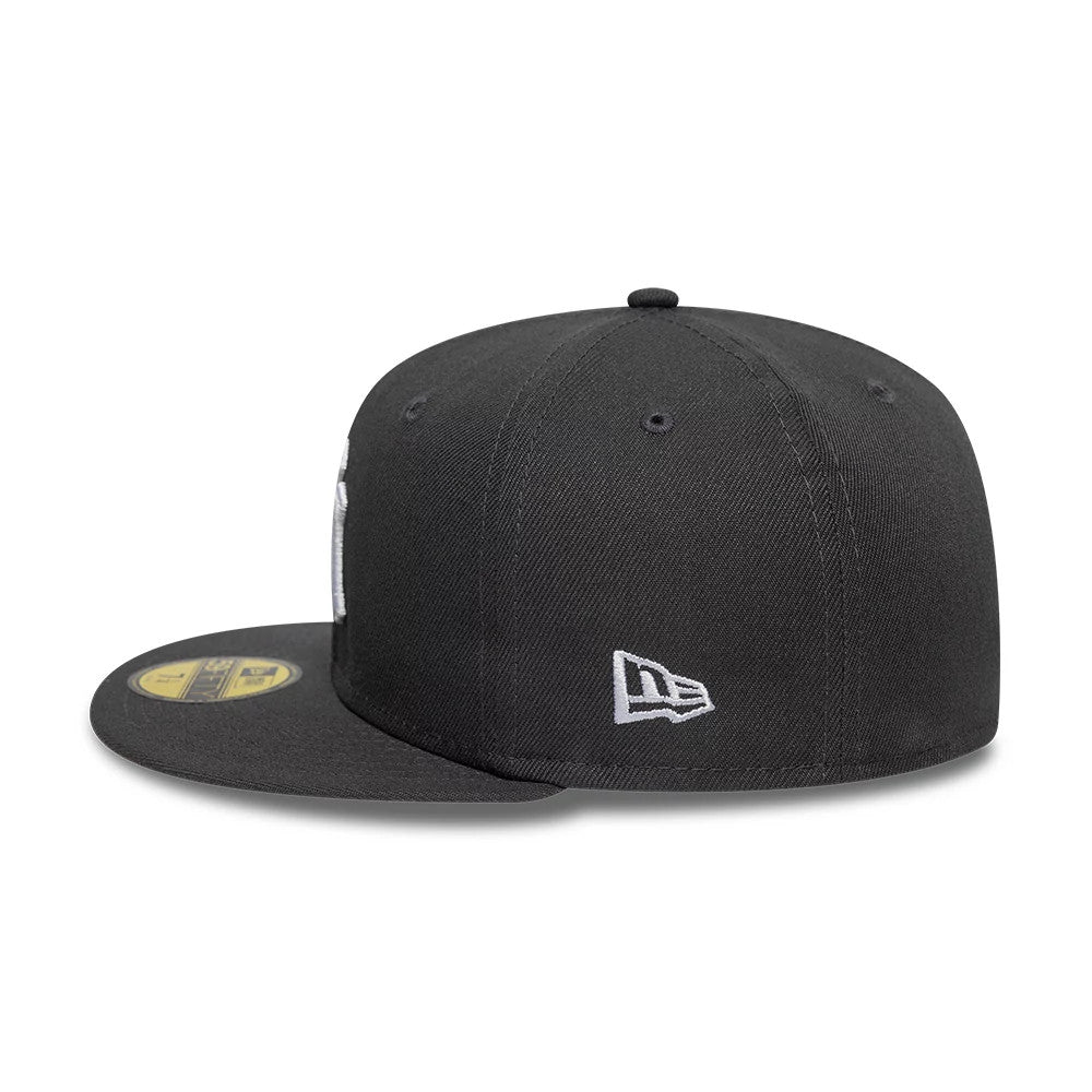 New York Yankees Essential Grey New Era 59FIFTY Fitted Cap, side view showing the embroidered white New Era flag logo on the left side of the grey structured crown and a gold 59FIFTY size sticker on the visor.