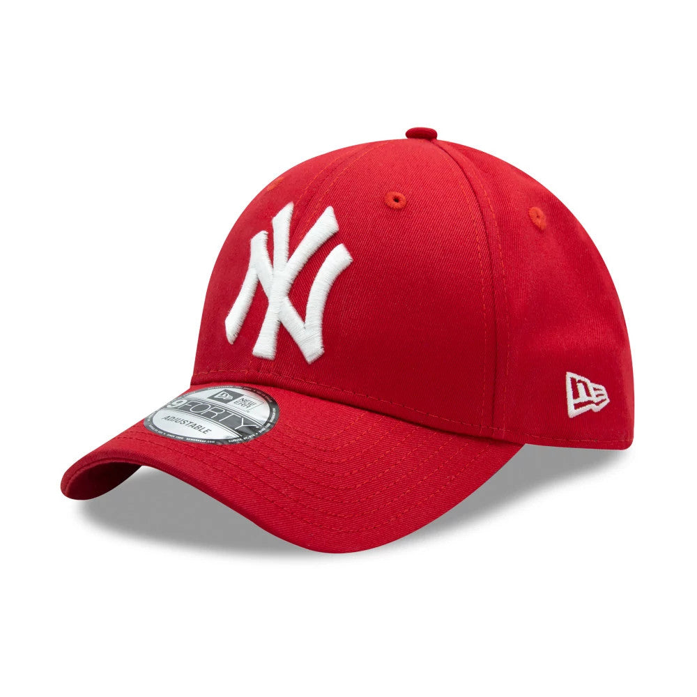 New York Yankees Essential Red New Era 9FORTY Cap, three-quarter view showing the raised white embroidered NY logo on the front panel, red visor with a 9FORTY size sticker, and the New Era flag logo on the left side.