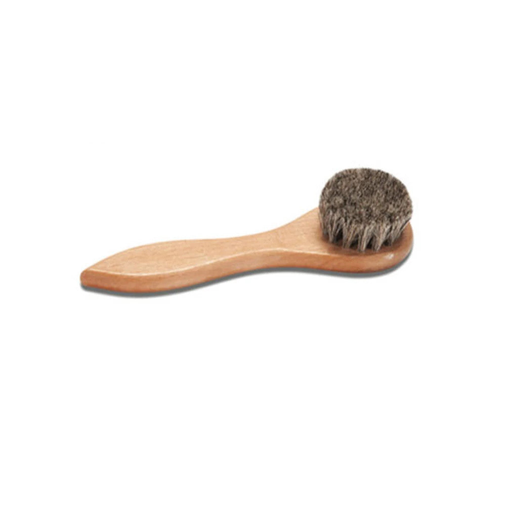 New Era Wooden Cap Brush, angled view showing the smooth wooden handle with natural grain and soft bristles for gentle cap cleaning, highlighting its ergonomic design and quality craftsmanship.