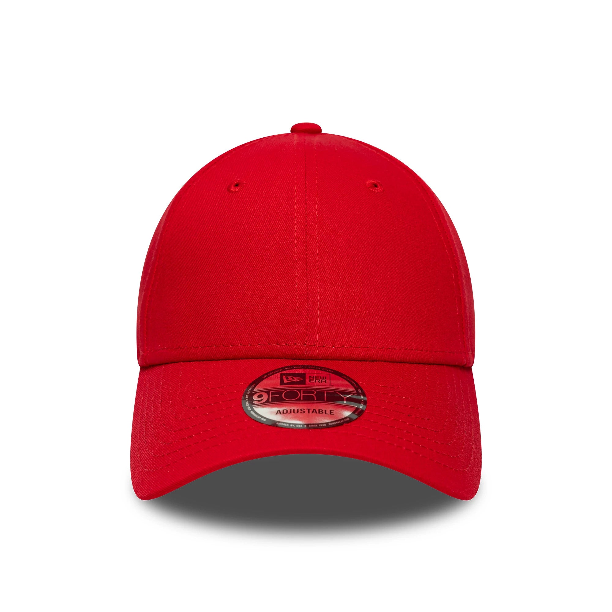 New Era Flag Red New Era 9FORTY Cap, front view with a curved structured visor featuring a 9FORTY size sticker and a plain front panel emphasizing the vibrant red colour and stitched eyelets.