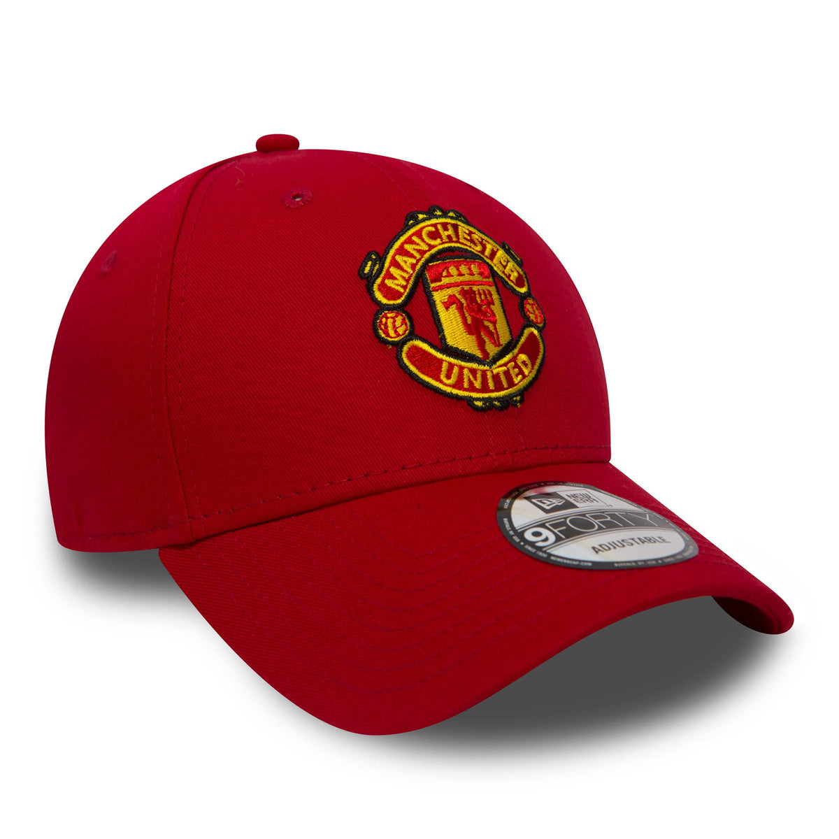 Manchester United Essential Red New Era 9FORTY Cap, front view with a raised embroidered club crest on the front panel, a curved visor featuring the 9FORTY size sticker, and a structured red crown with matching eyelets and top button.