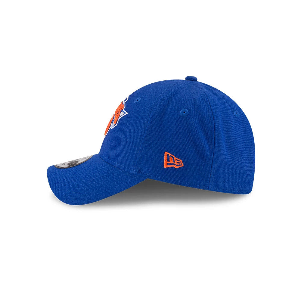 New York Knicks The League Blue New Era 9FORTY Cap, side view showing the orange New Era flag logo on the left side and the structured crown, with a curved visor and 9FORTY size sticker.