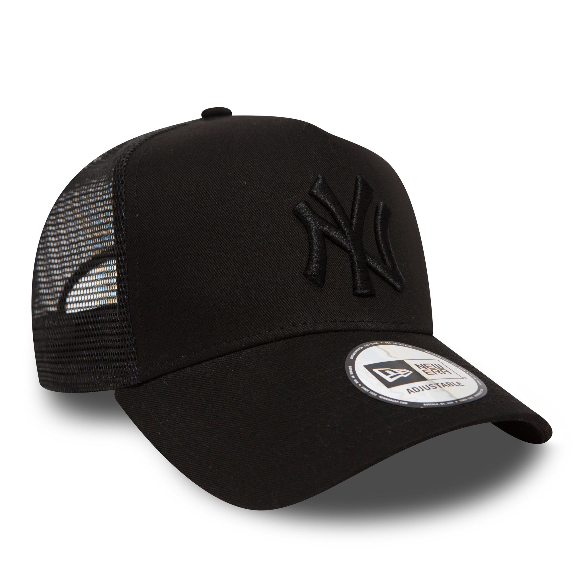 New York Yankees Clean Black On Black A-Frame Trucker Cap, three-quarter view showing the raised black embroidered NY logo on the front panel, with a mesh rear and a New Era adjustable sticker on the curved visor.