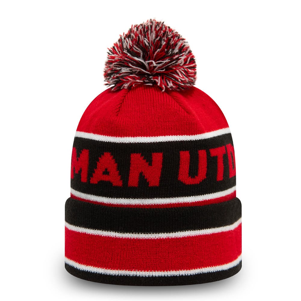Manchester United Striped Red Multi Bobble Beanie Hat, front view showing a red and black striped design with Manchester Utd text in bold across the centre, topped with a red, black, and white mixed yarn bobble.