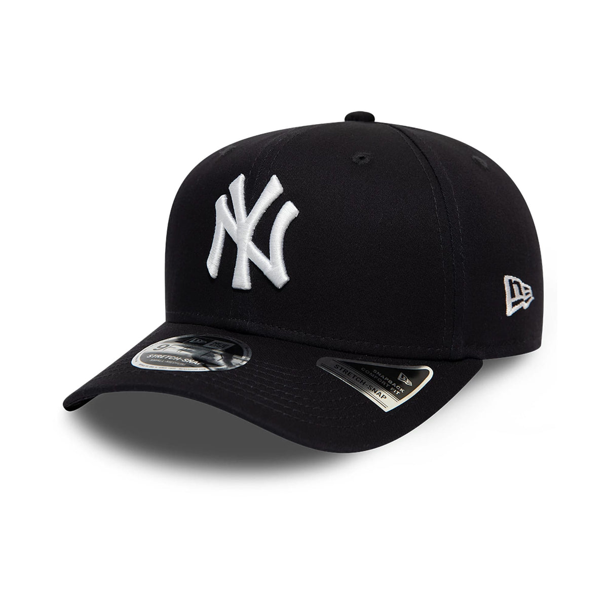 New York Yankees Navy New Era 9FIFTY Stretch Snap Cap, three-quarter view showing the raised white NY logo on the front panel, matching navy curved visor with a 9FIFTY size sticker, and white New Era flag logo on the left side.