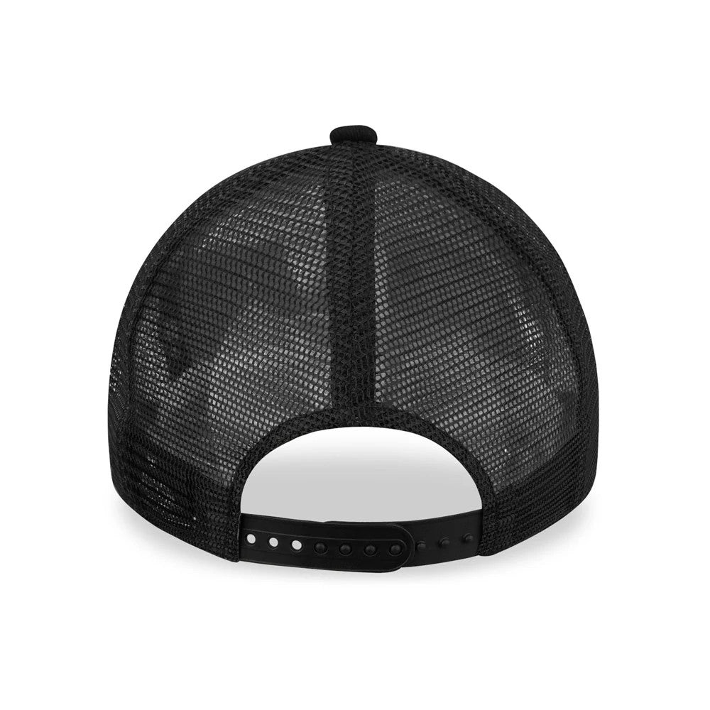 New Era Patch Black A-Frame Trucker Cap, rear view showing the black mesh back panels and adjustable snap closure, highlighting the open-hole design that characterizes the structured trucker style.