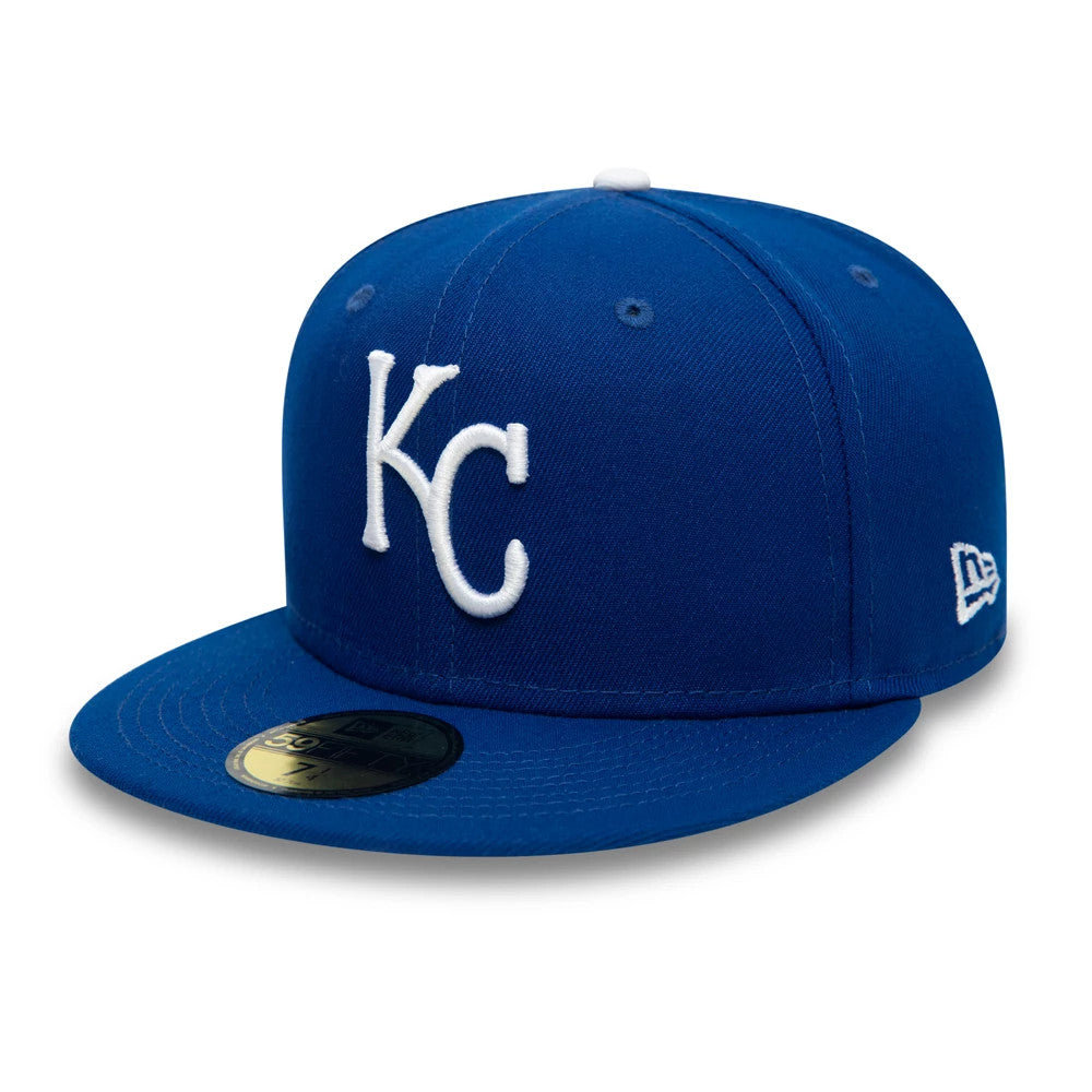 Kansas City Royals AC Perf Blue New Era 59FIFTY Cap, front view showing raised white KC lettering on the front panel, a matching blue visor with a gold 59FIFTY size sticker, and the New Era flag logo on the left side.
