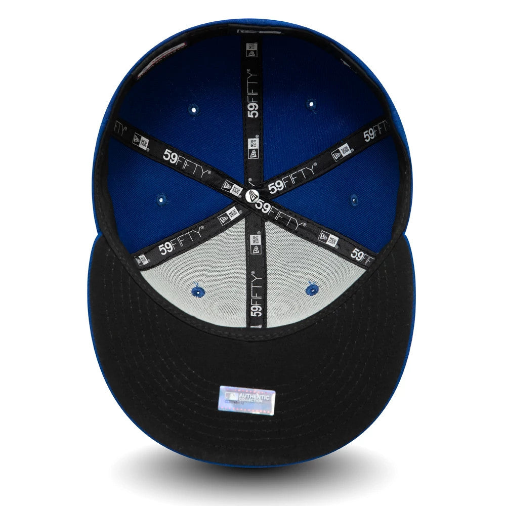 Kansas City Royals AC Perf Blue New Era 59FIFTY Cap, inside view showing grey undervisor, black taping with white 59FIFTY lettering, blue panel eyelets, and a black visor with an MLB Authentic Collection sticker.