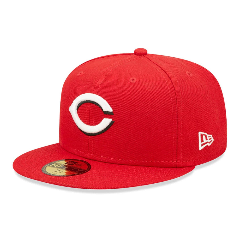 Cincinnati Reds AC Perf Red New Era 59FIFTY Cap, three-quarter view showing the raised white and black embroidered C logo on the front panel, flat red visor with gold 59FIFTY size sticker, and New Era flag logo on the left side.