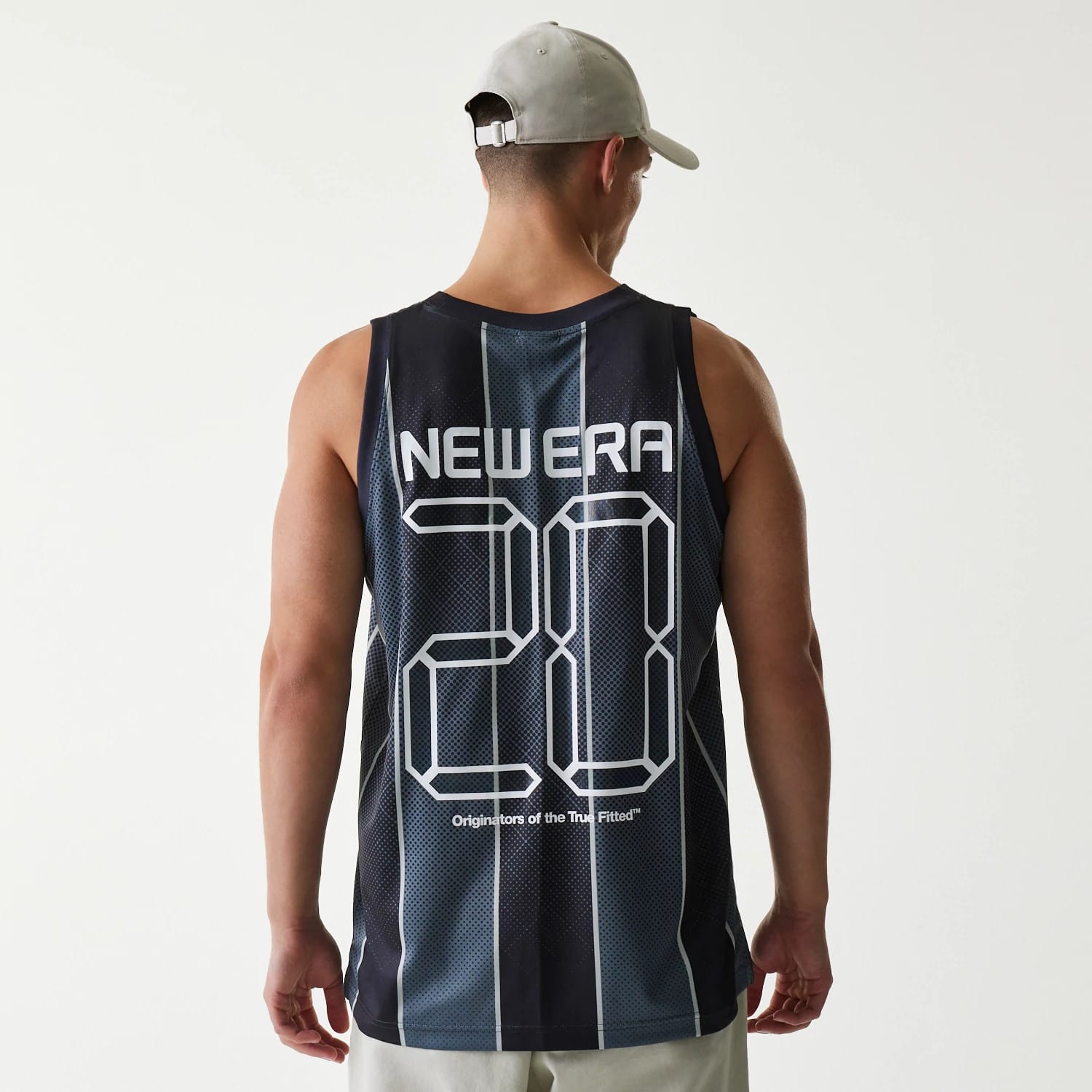 New Era City Sport Black Tank Top, back view on a model wearing a grey cap, featuring NEWEA 20 lettering in a digital style across the upper back of a mesh design with vertical stripes.