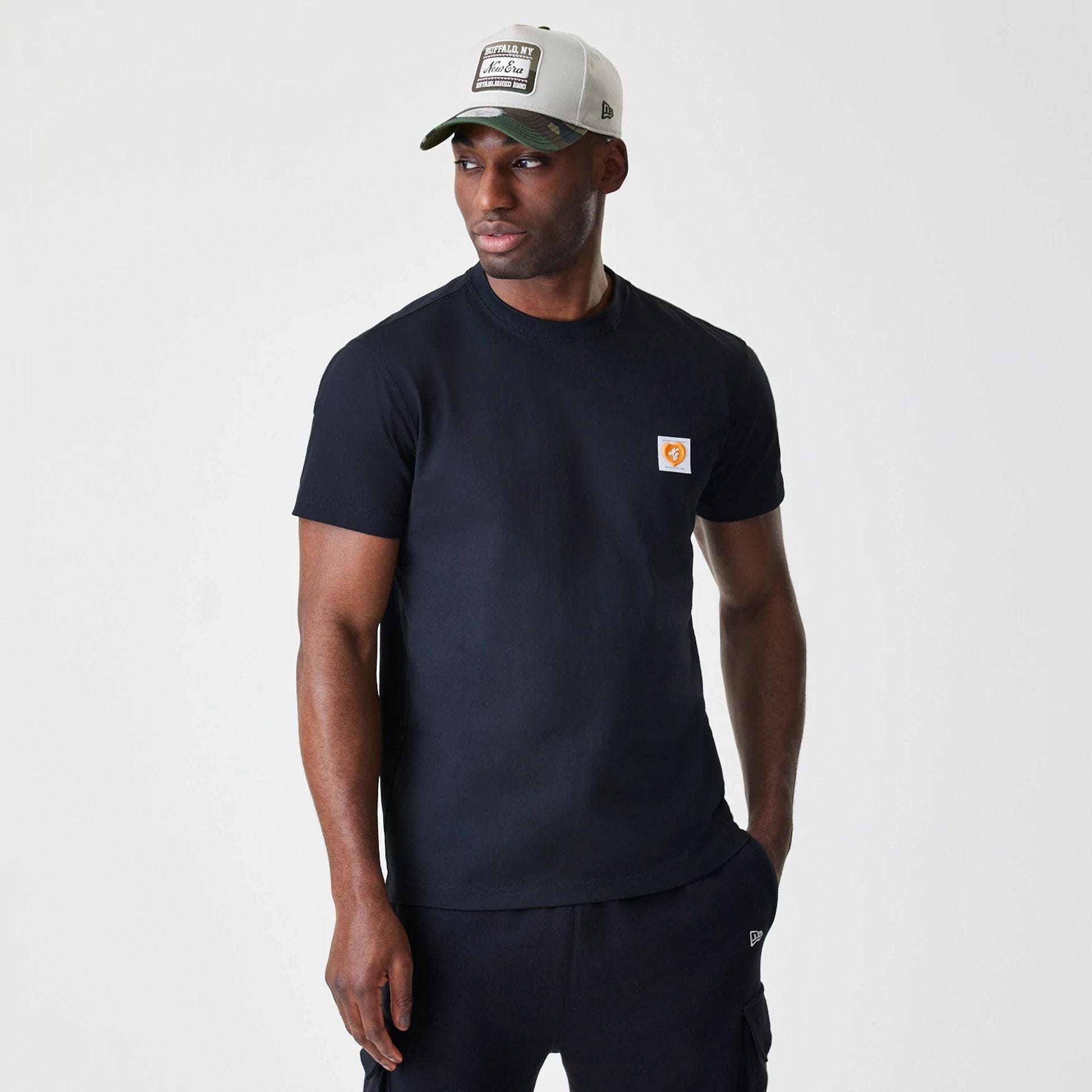 The Male model is wearing New Era Valentine's Day Black T-Shirt 1