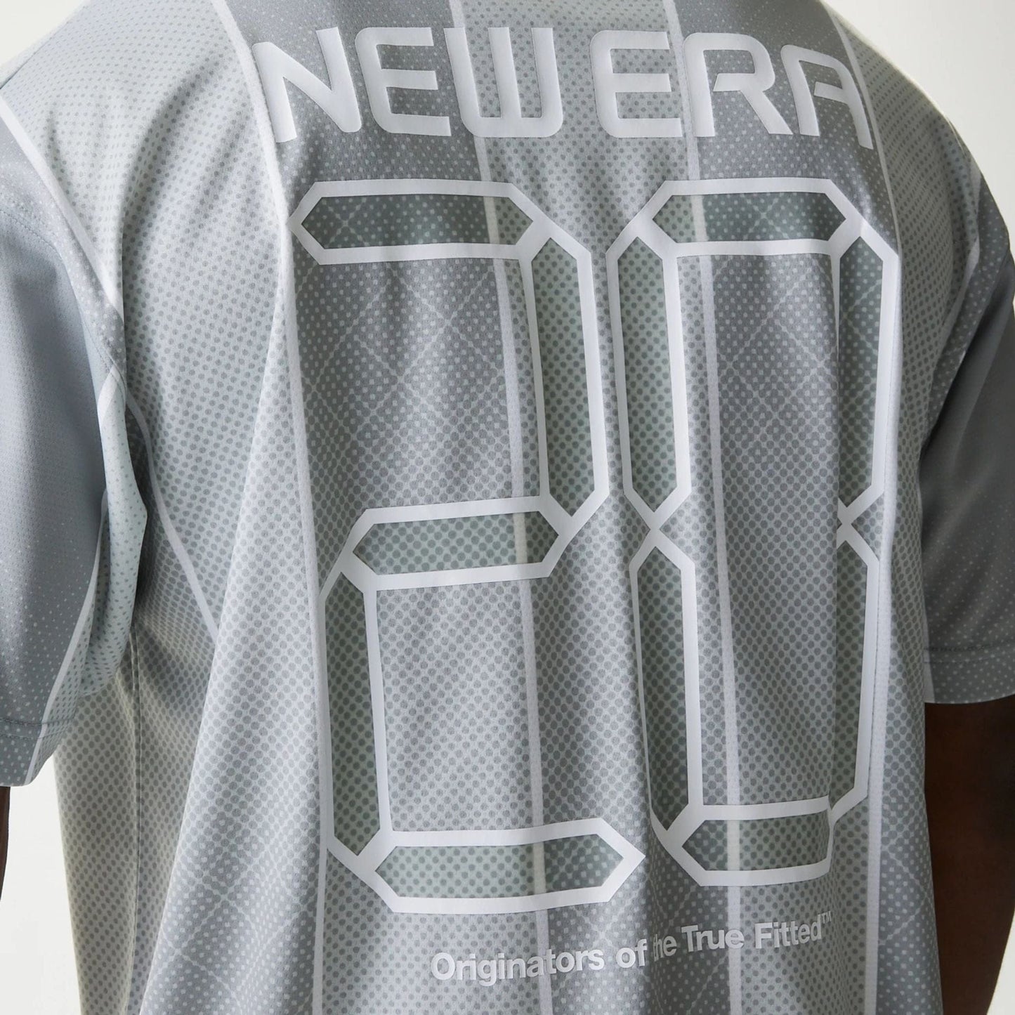 The Male model is wearing New Era City Sport Grey T-Shirt 7