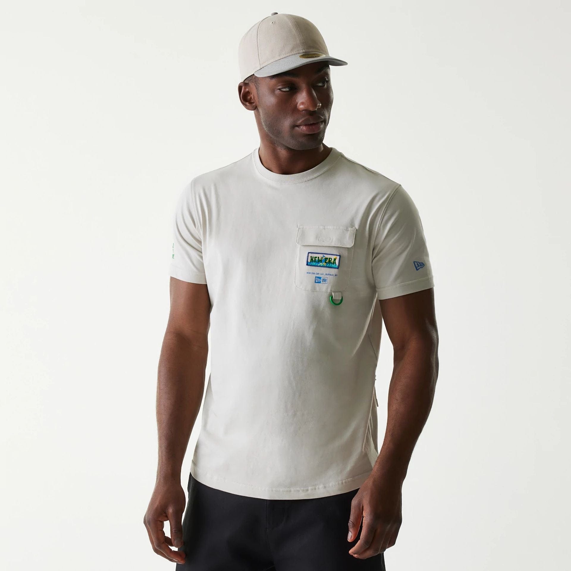 The Male model is wearing New Era Outdoor Earth Day Stone T-Shirt 1