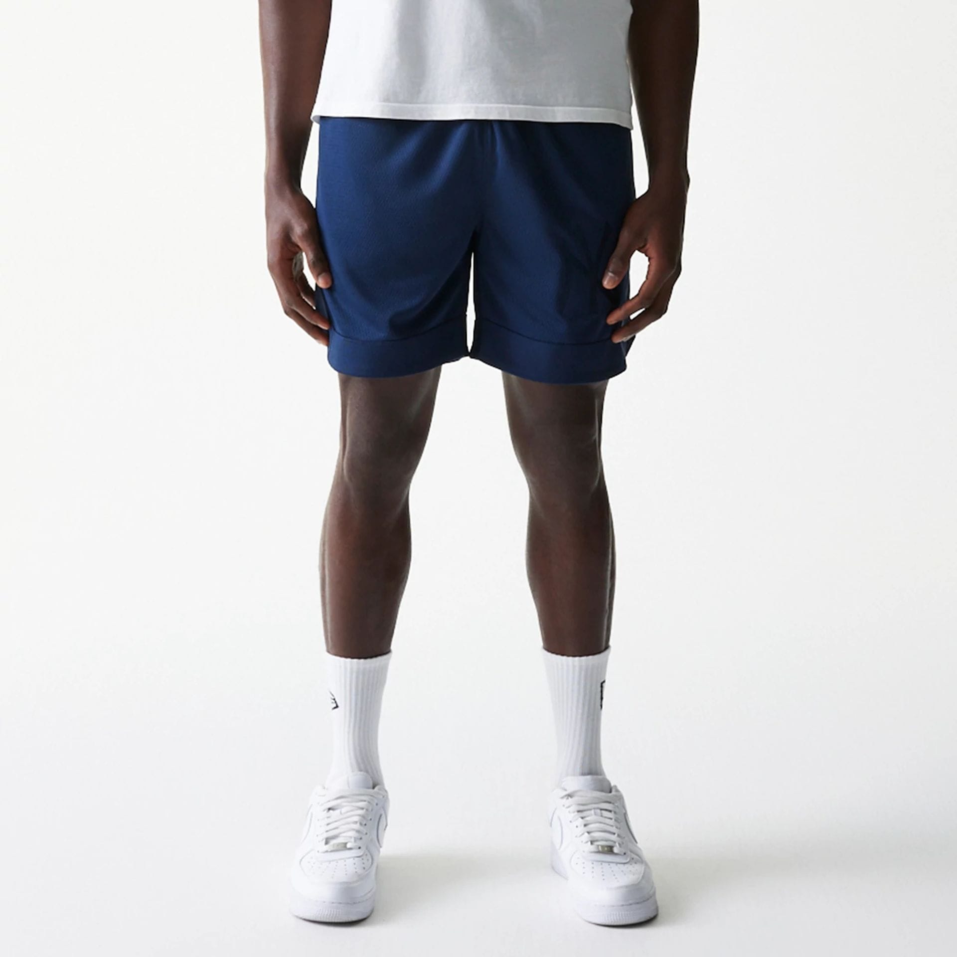 The Male model is wearing New York Yankees Tonal Pack Blue Shorts 1