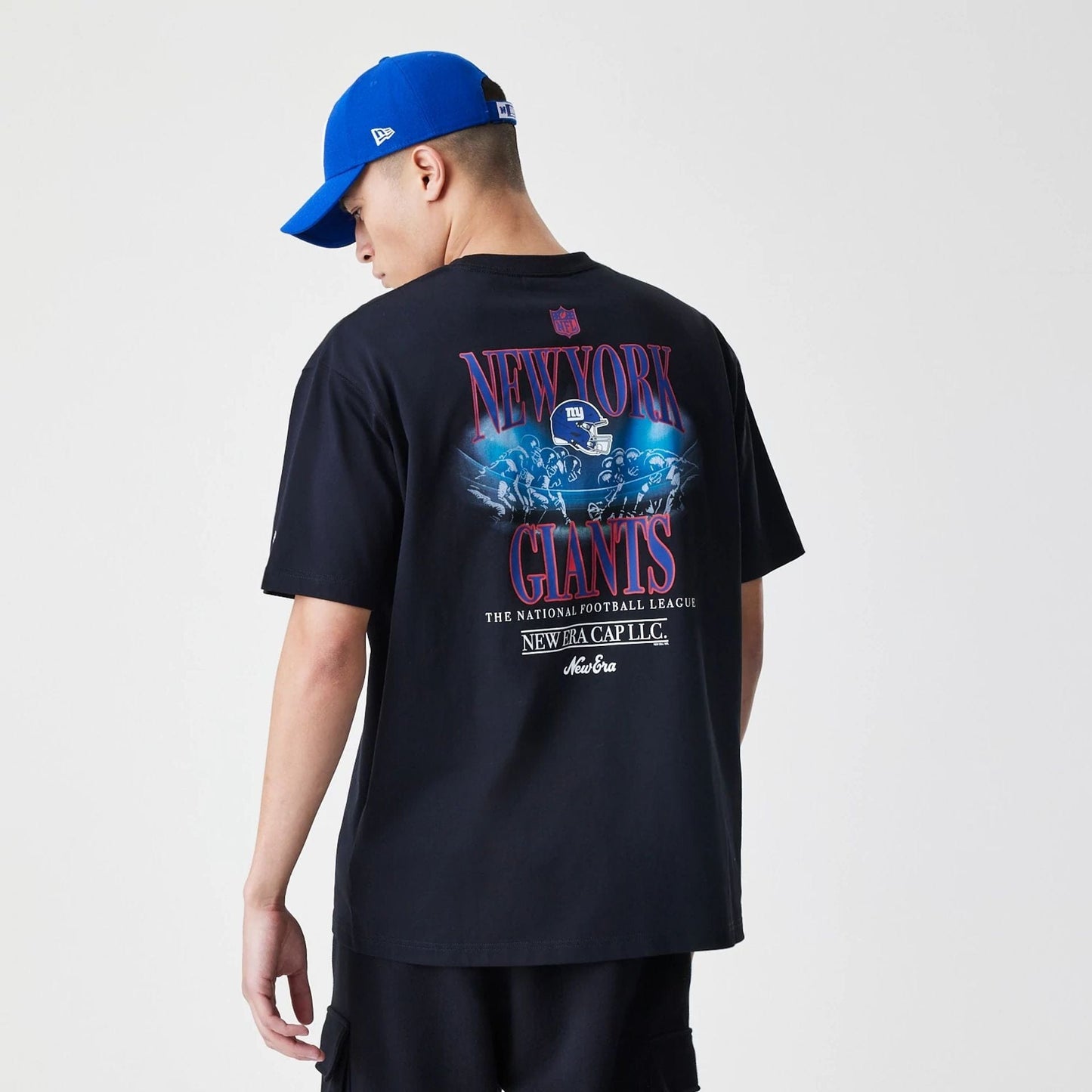 The Male model is wearing New York Giants NFL Black Oversized T-Shirt 6