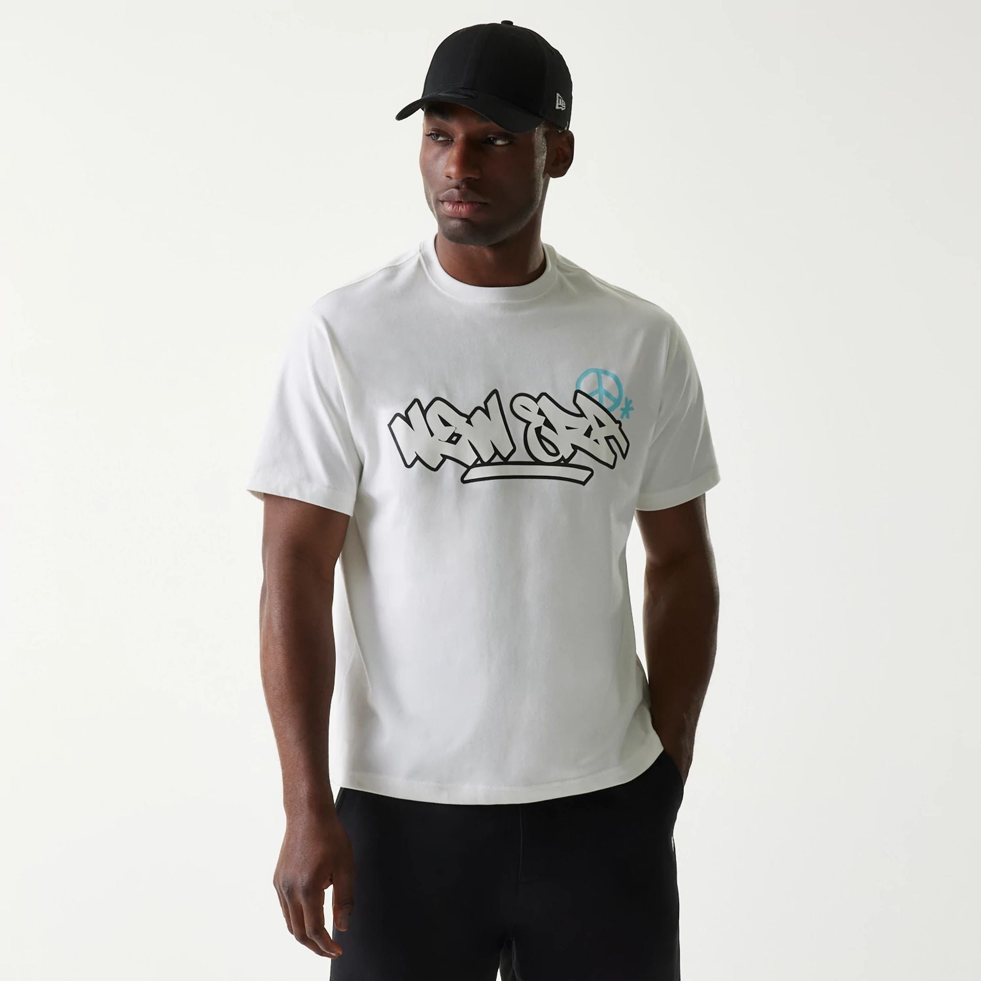 The Male model is wearing New Era Peace Symbol White T-Shirt 1