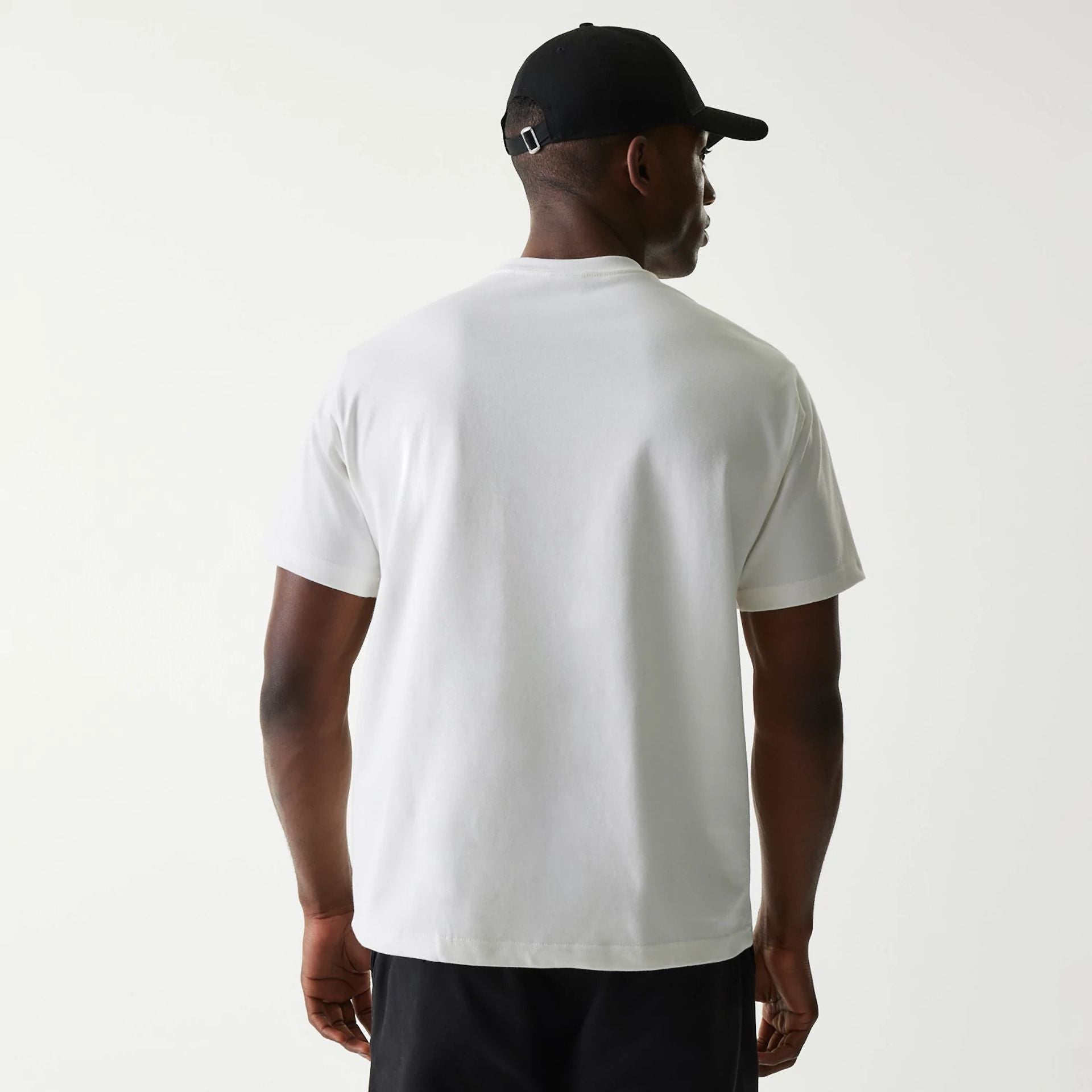 The Male model is wearing New Era Peace Symbol White T-Shirt 2