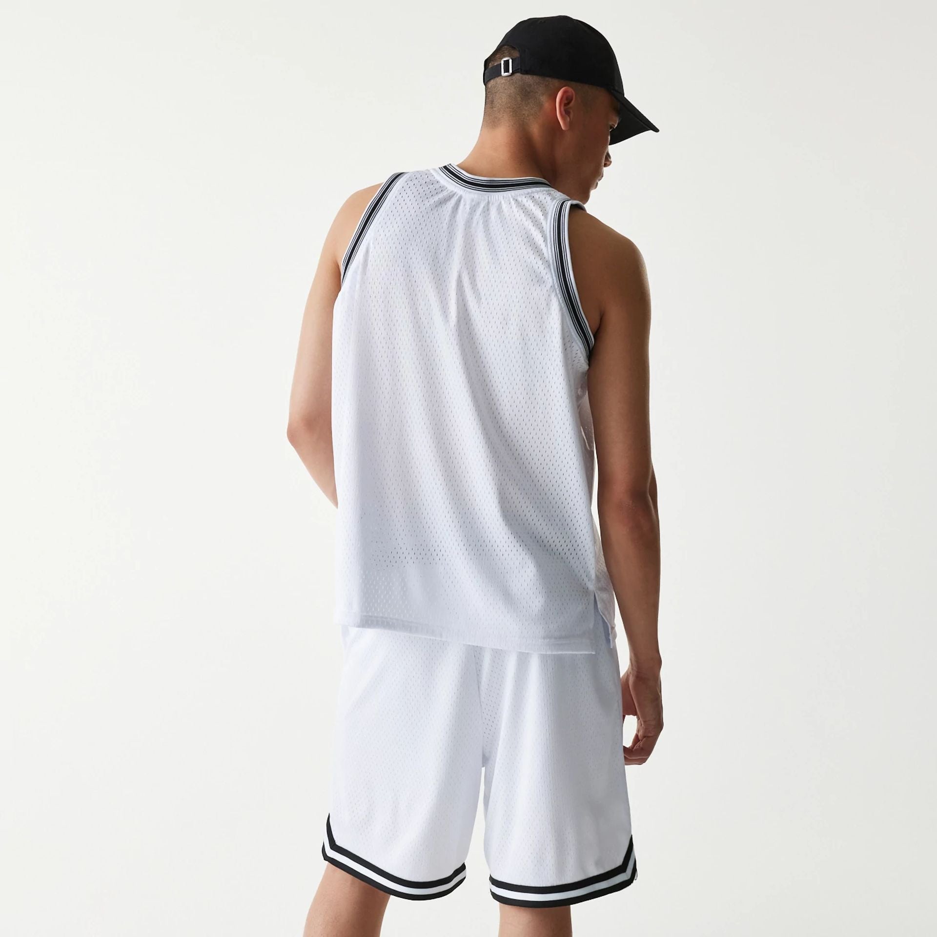The Male model is wearing New Era Japan Mesh White Sleeveless T-Shirt 2