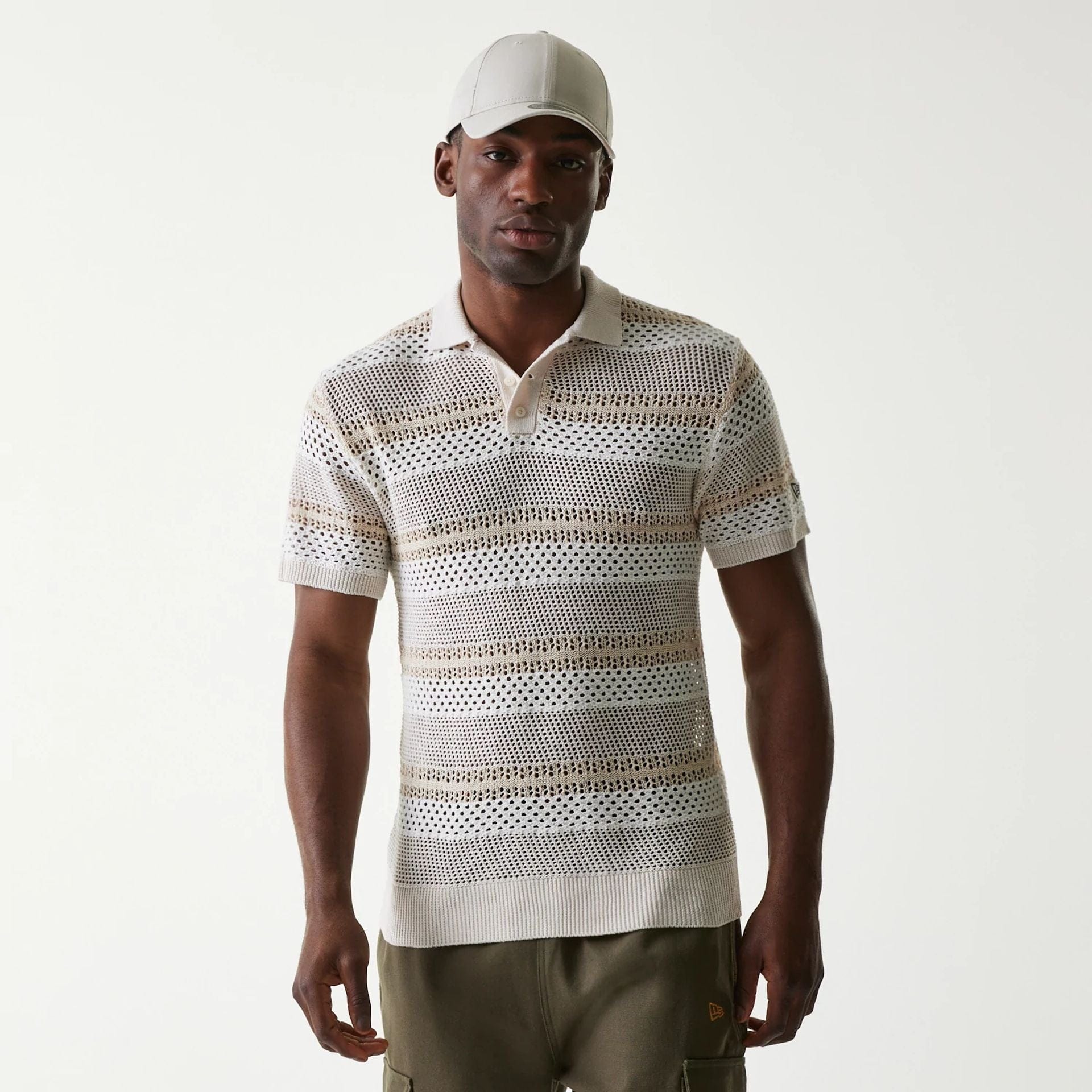 The Male model is wearing New Era Japan Mesh White Polo T-Shirt 1