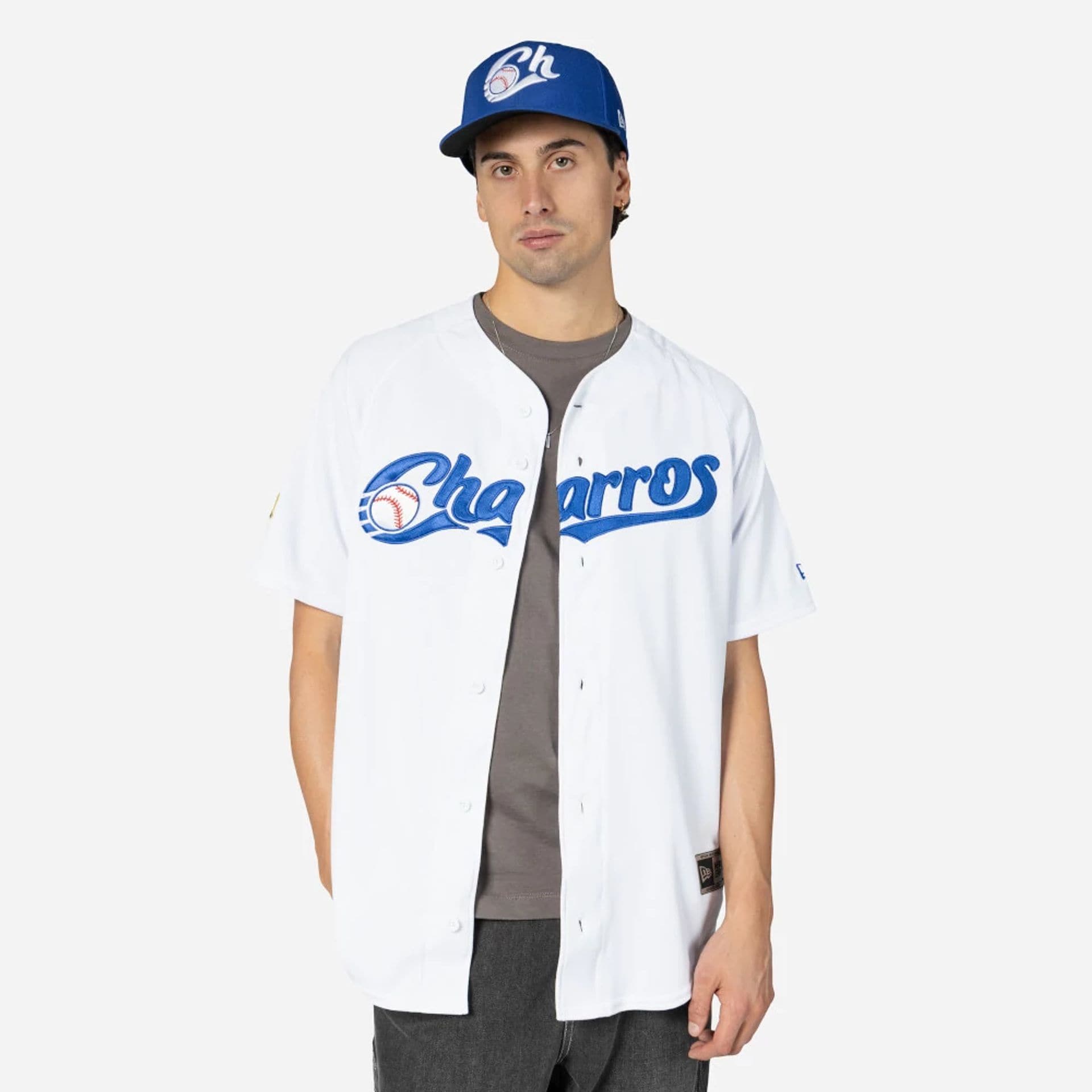 The Male model is wearing Charros De Jalisco Mexico LMB On Field White On-Field Jersey 1