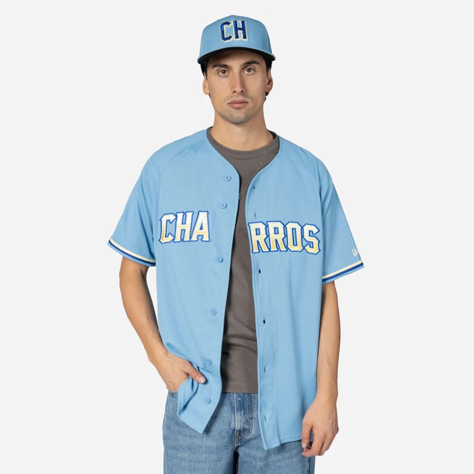 The Male model is wearing Charros De Jalisco Mexico LMB On Field Pastel Blue On-Field Jersey 1