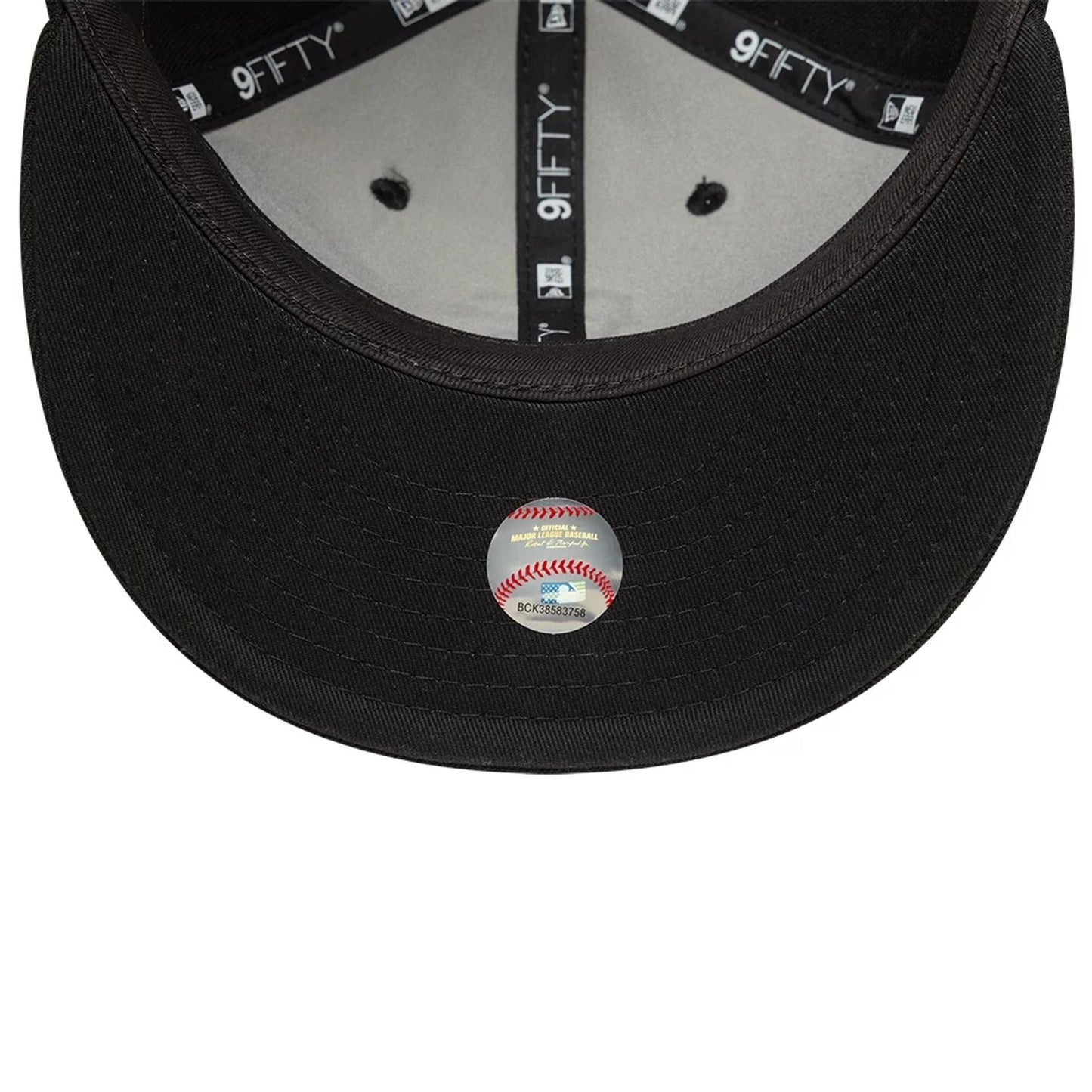 San Francisco Giants MLB X Saint Mxxxxxx Black Retro Crown New Era 9FIFTY Snapback Adjustable Cap, inside view showing black taping with repeated 9FIFTY logos and a grey sweatband beneath the black undervisor with a baseball-themed sticker.