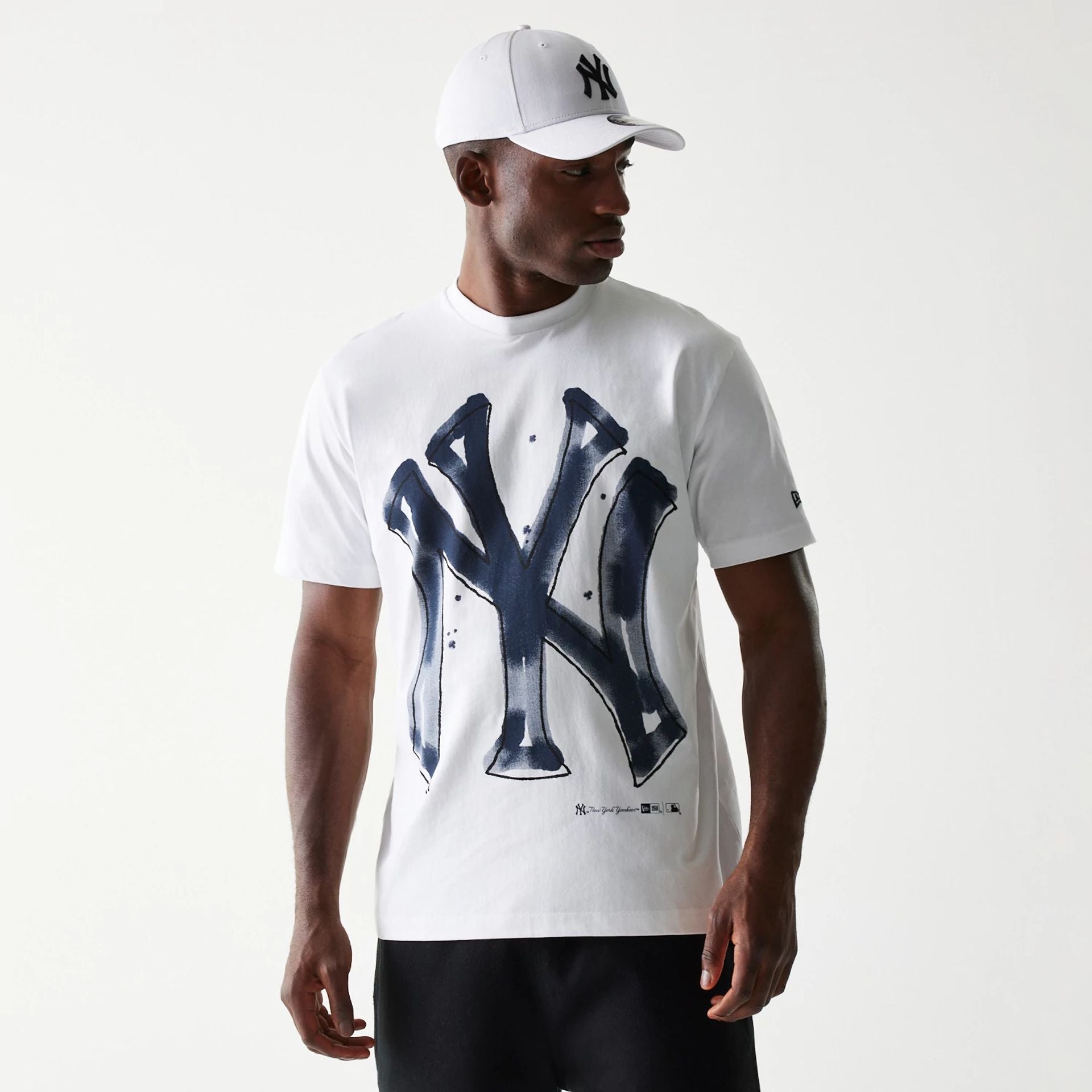 The Male model is wearing New York Yankees MLB Paint White Oversized T-Shirt 1