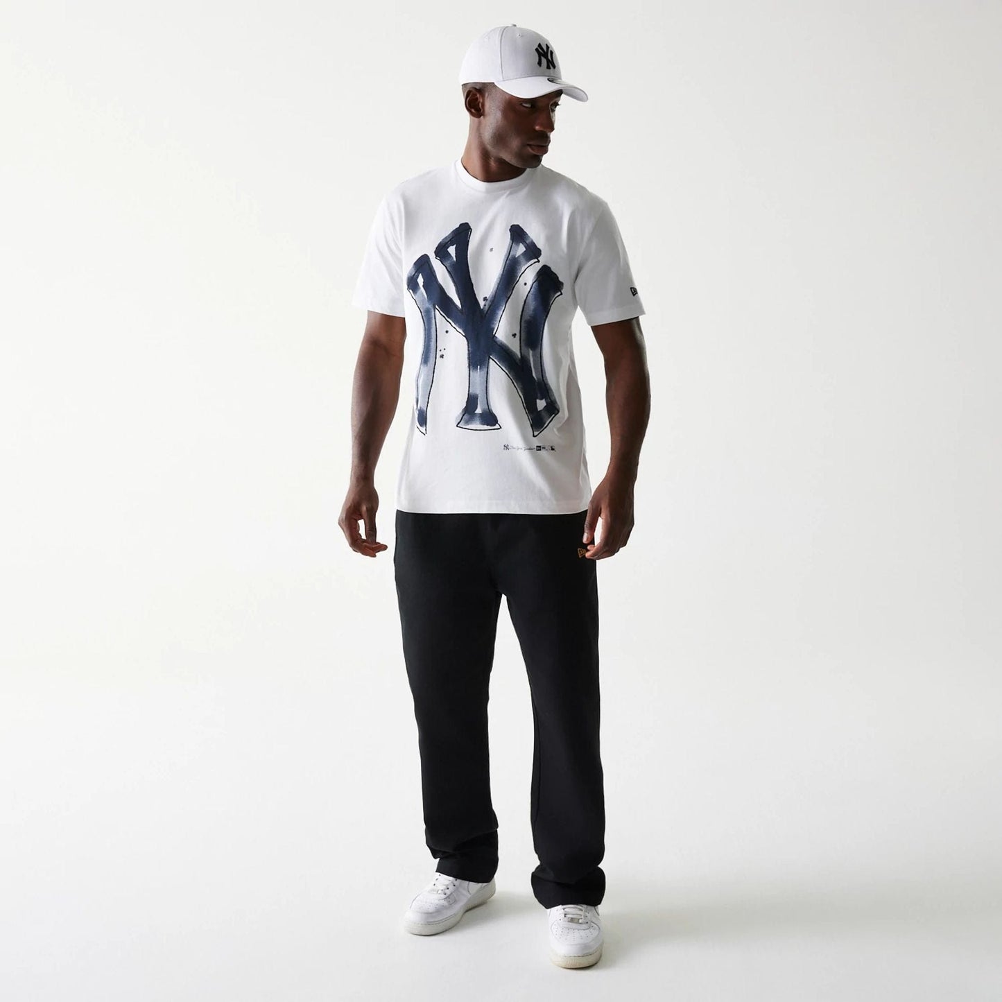 The Male model is wearing New York Yankees MLB Paint White Oversized T-Shirt 7