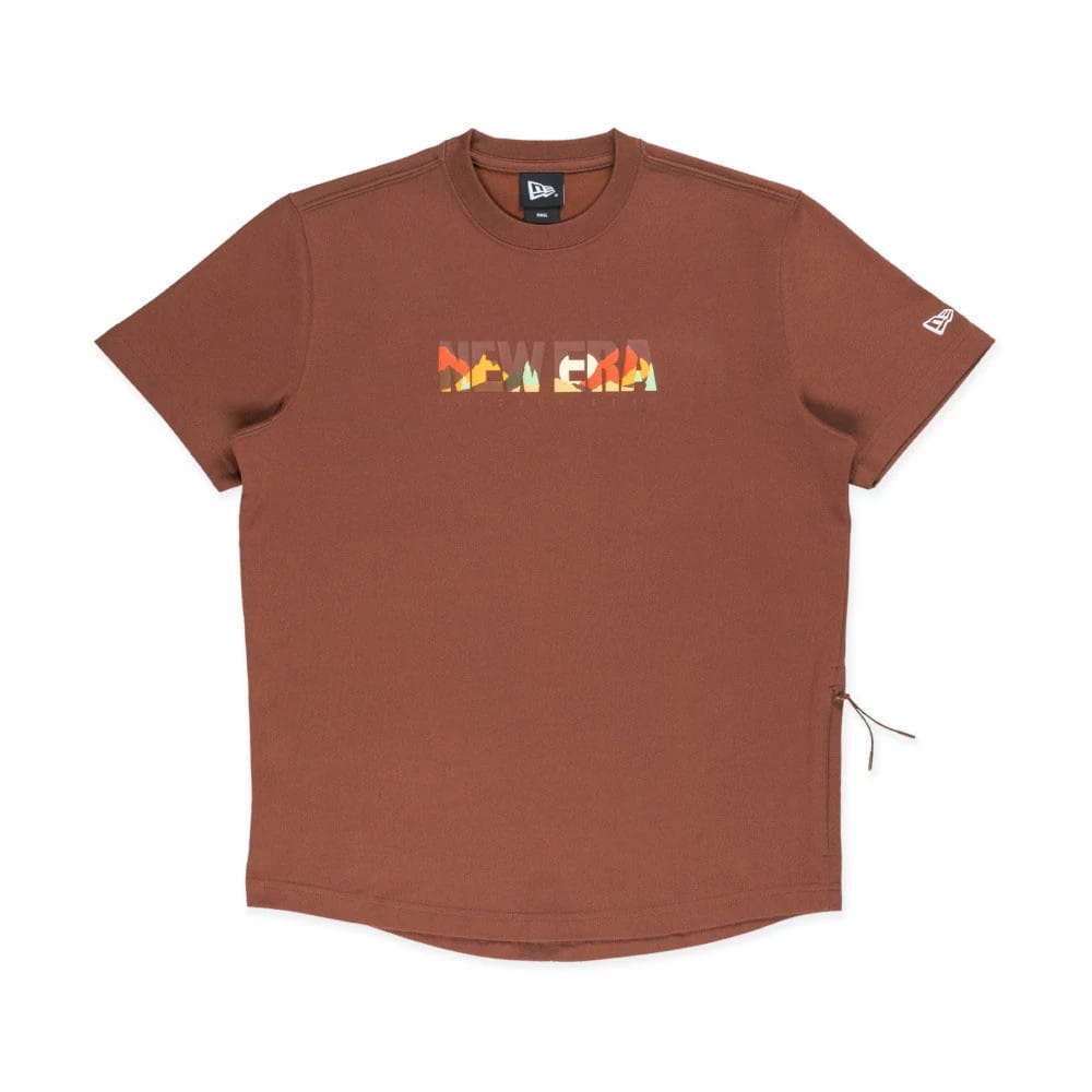 The model is wearing this New Era Mountain Logo T-Shirt in Open Brown. 1