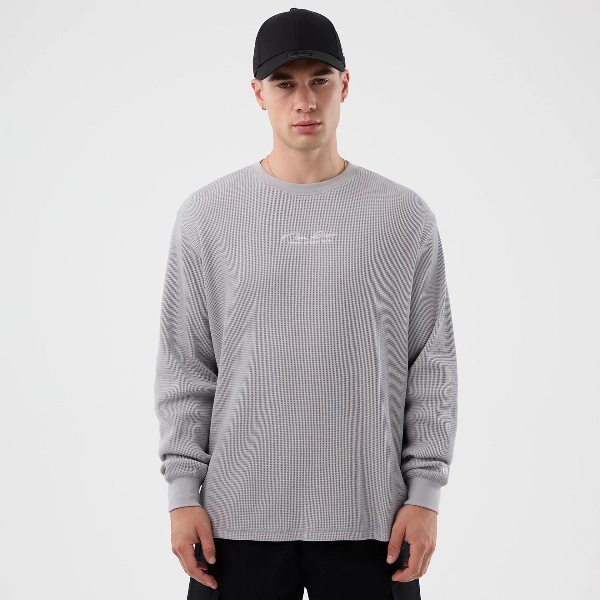 The Male model is wearing New Era Basic Grey Long Sleeve T-Shirt 1