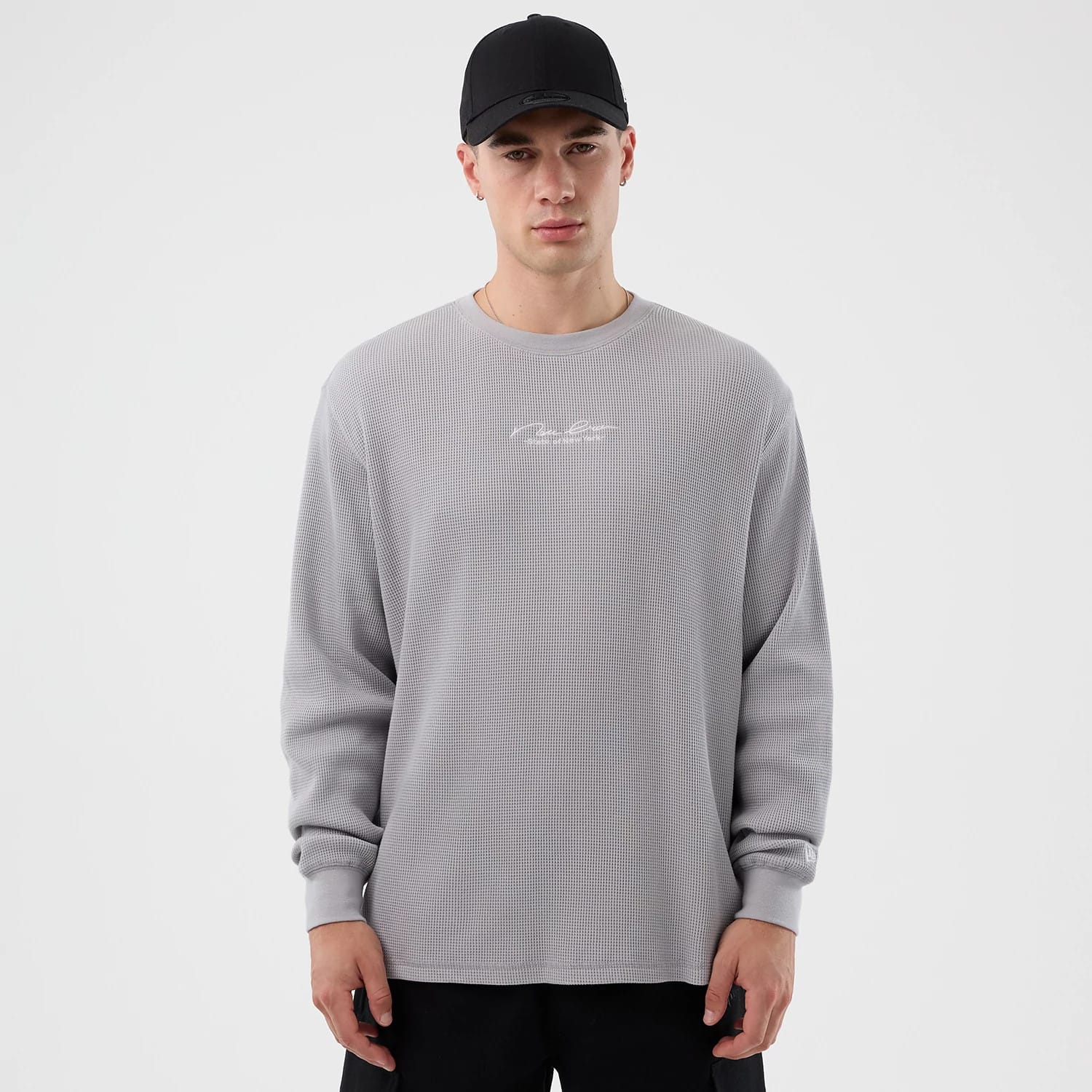 The Male model is wearing New Era Basic Grey Long Sleeve T-Shirt 1