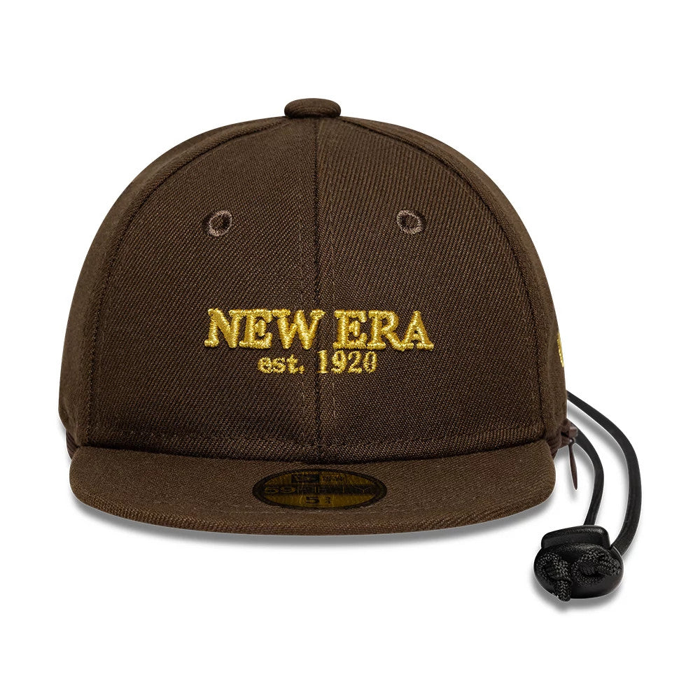 New Era Year Of The Horse Dark Brown Cap Pouch, front view showing raised gold New Era embroidery on the centre front panel, two eyelets, a flat visor with a gold 59FIFTY size sticker, and an adjustable drawstring with a black toggle.