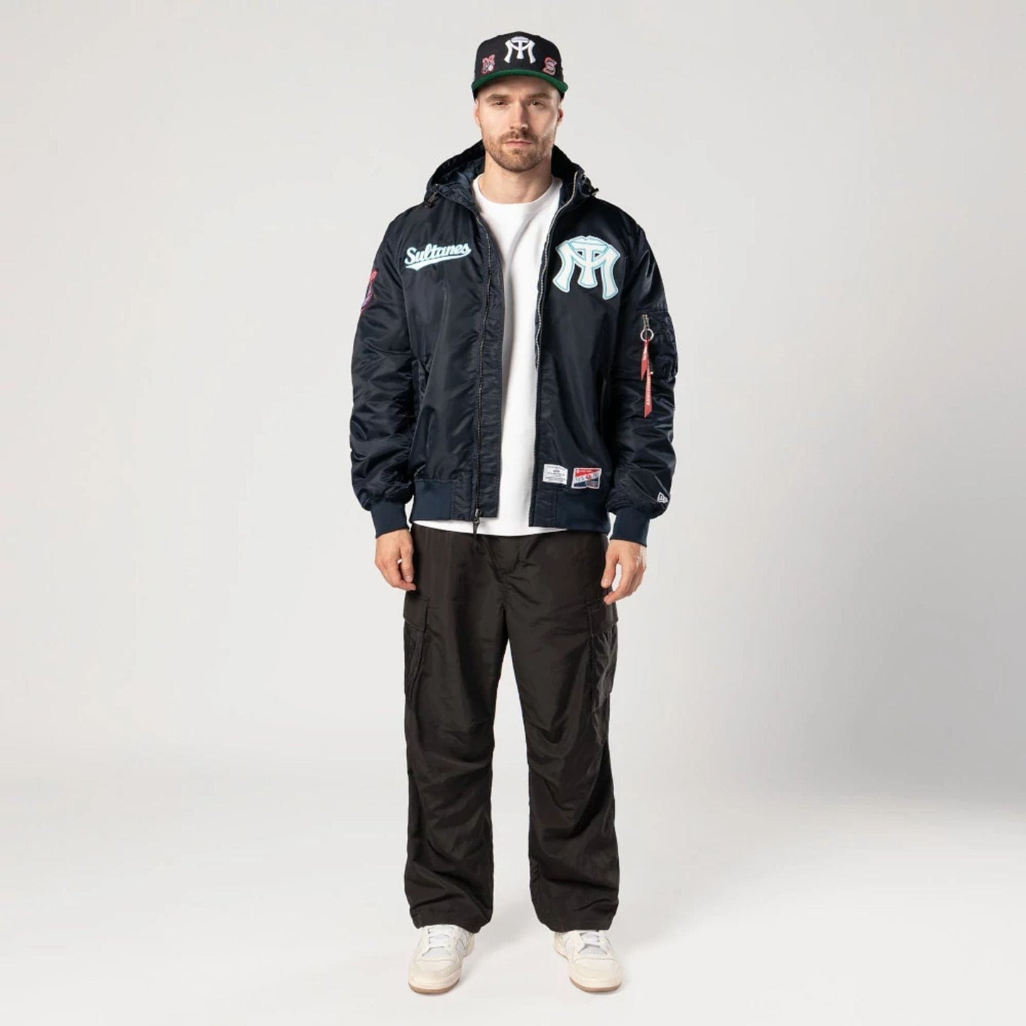 The Male model is wearing Sultanes De Monterrey LMB X Alpha Navy Jacket 7