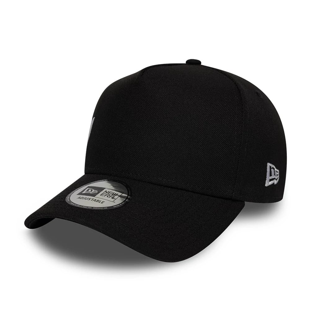 New Era Essential Black 9FORTY A-Frame Adjustable Cap, side view showing the curved visor with a 9FORTY size sticker on top, and the white embroidered New Era flag logo on the left side of the structured black crown.