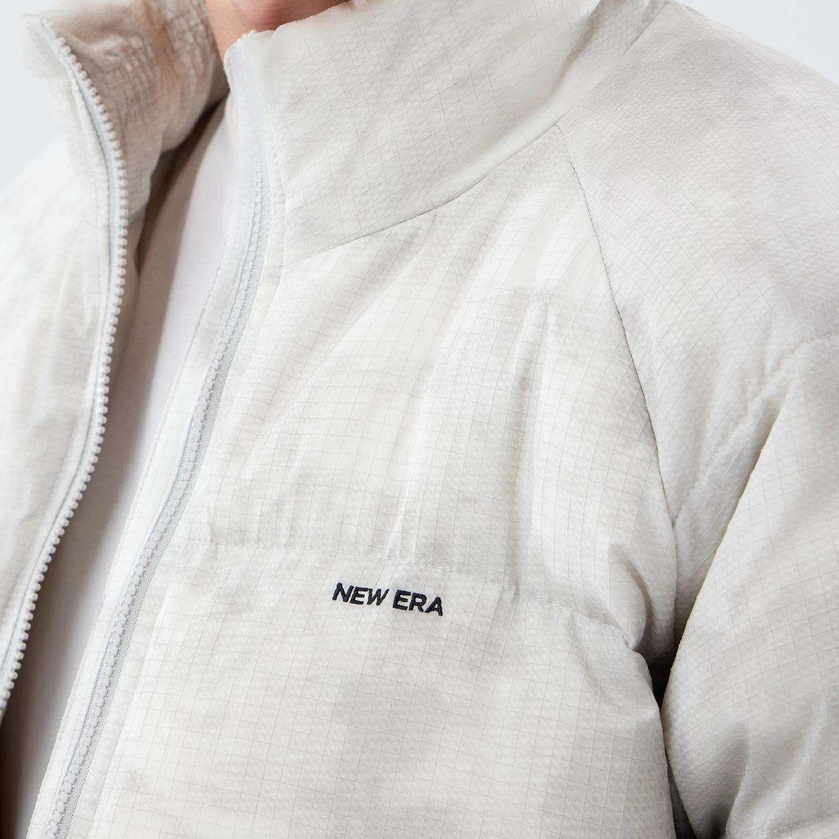The Male model is wearing New Era Outdoor Natural Down Jacket 7