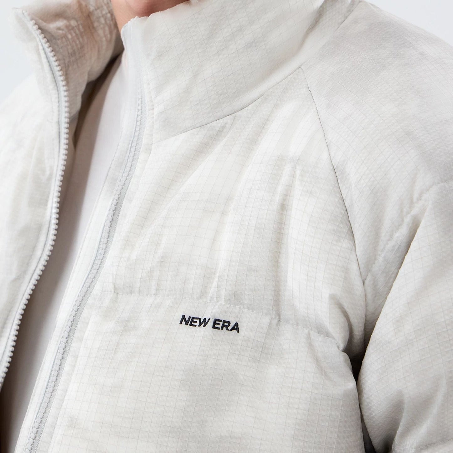 The Male model is wearing New Era Outdoor Natural Down Jacket 7