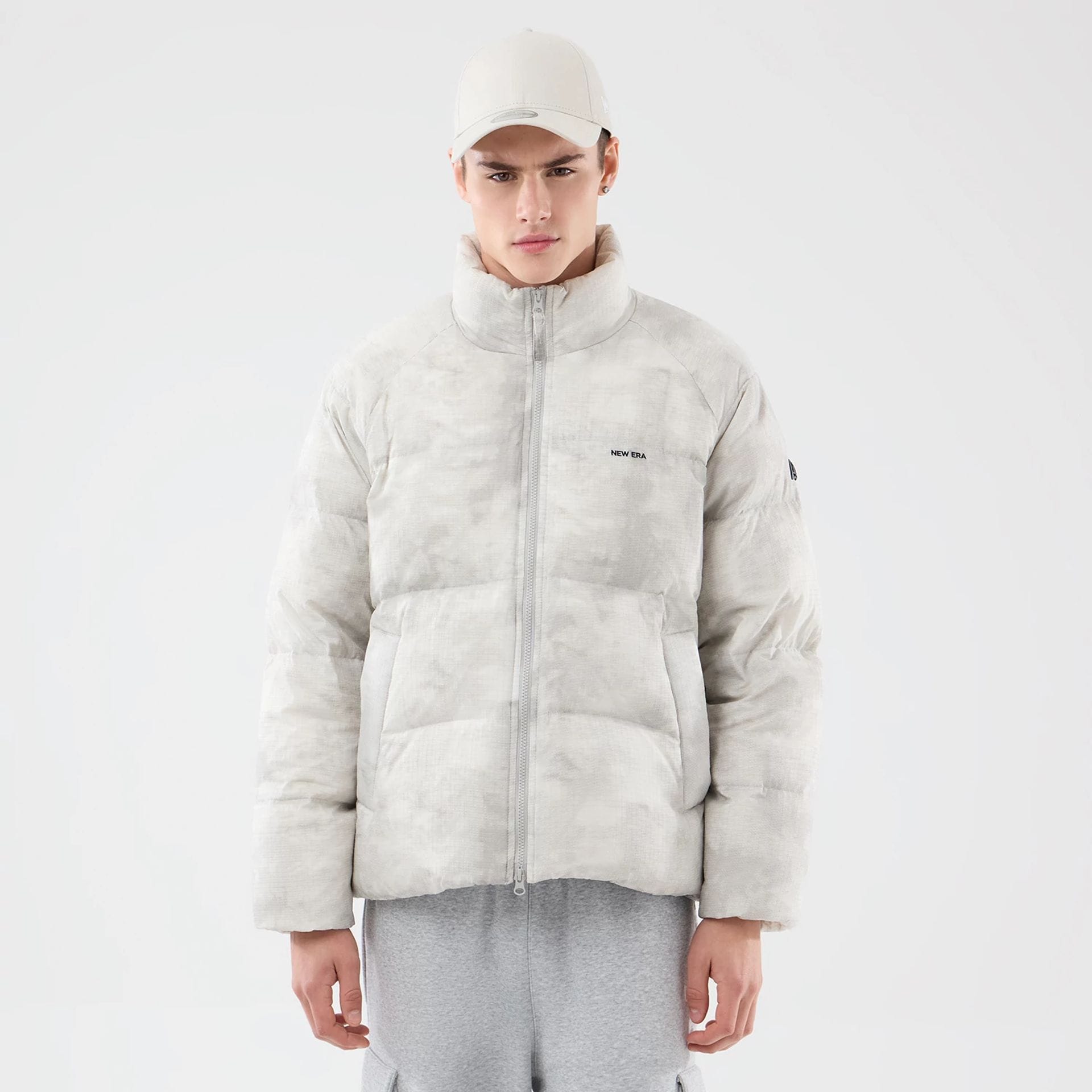 The Male model is wearing New Era Outdoor Natural Down Jacket 1