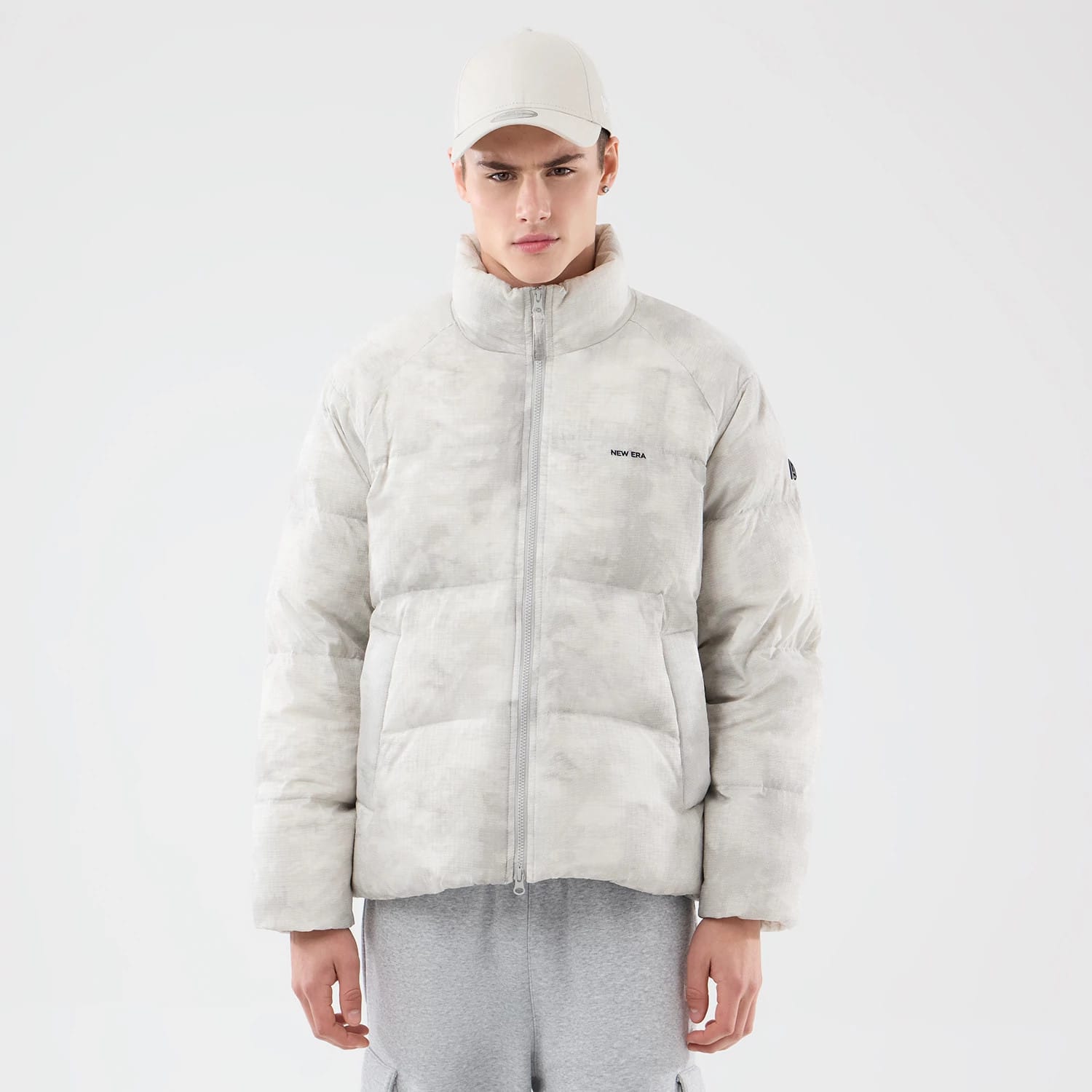 The Male model is wearing New Era Outdoor Natural Down Jacket 1
