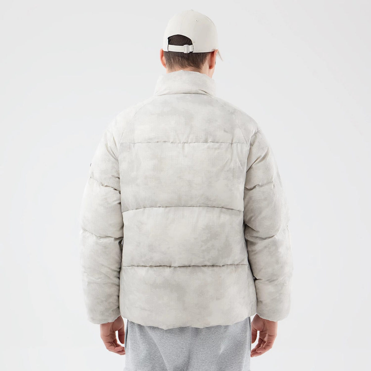 The Male model is wearing New Era Outdoor Natural Down Jacket 2