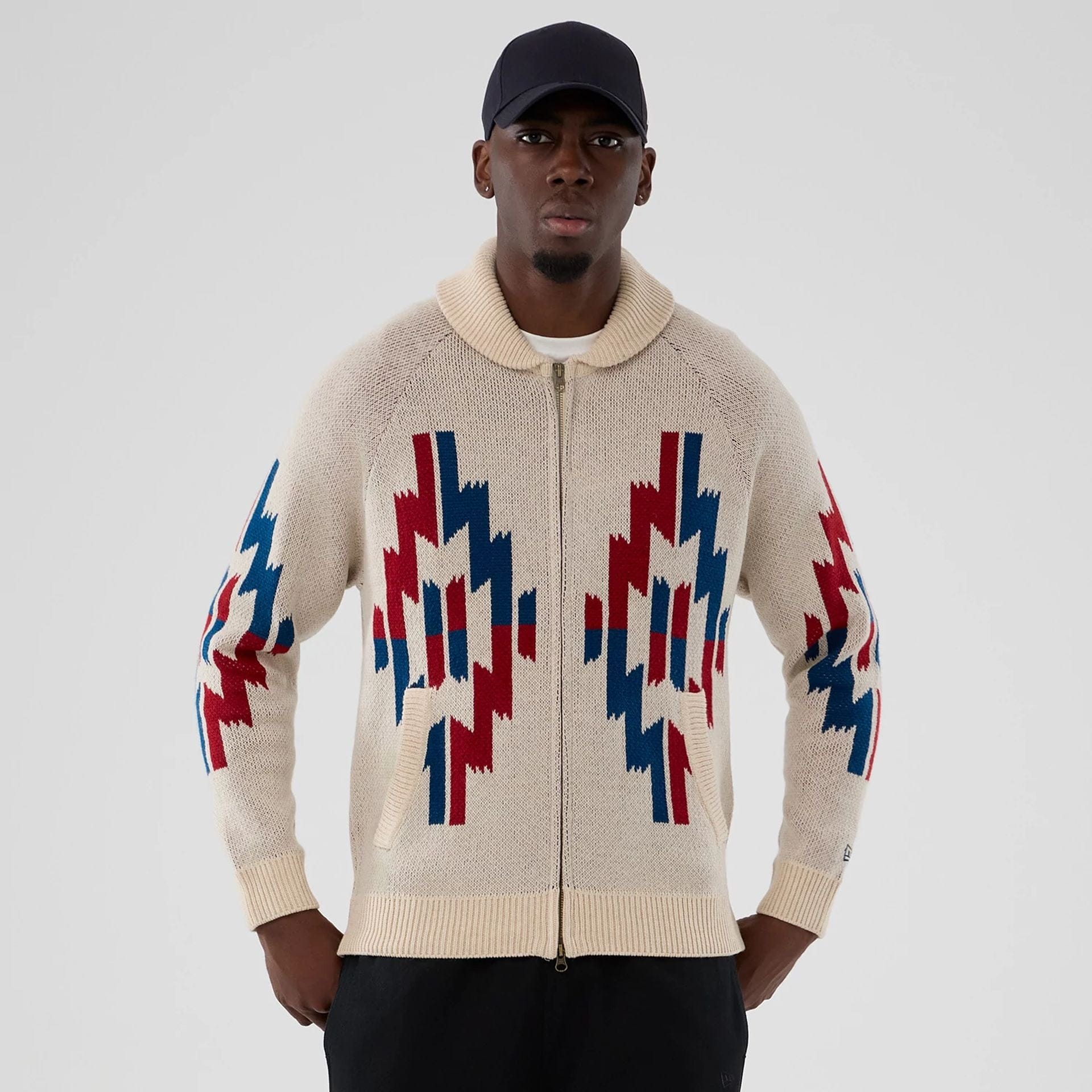 The Male model is wearing New Era Organic Cowichan Natural Cardigan 1