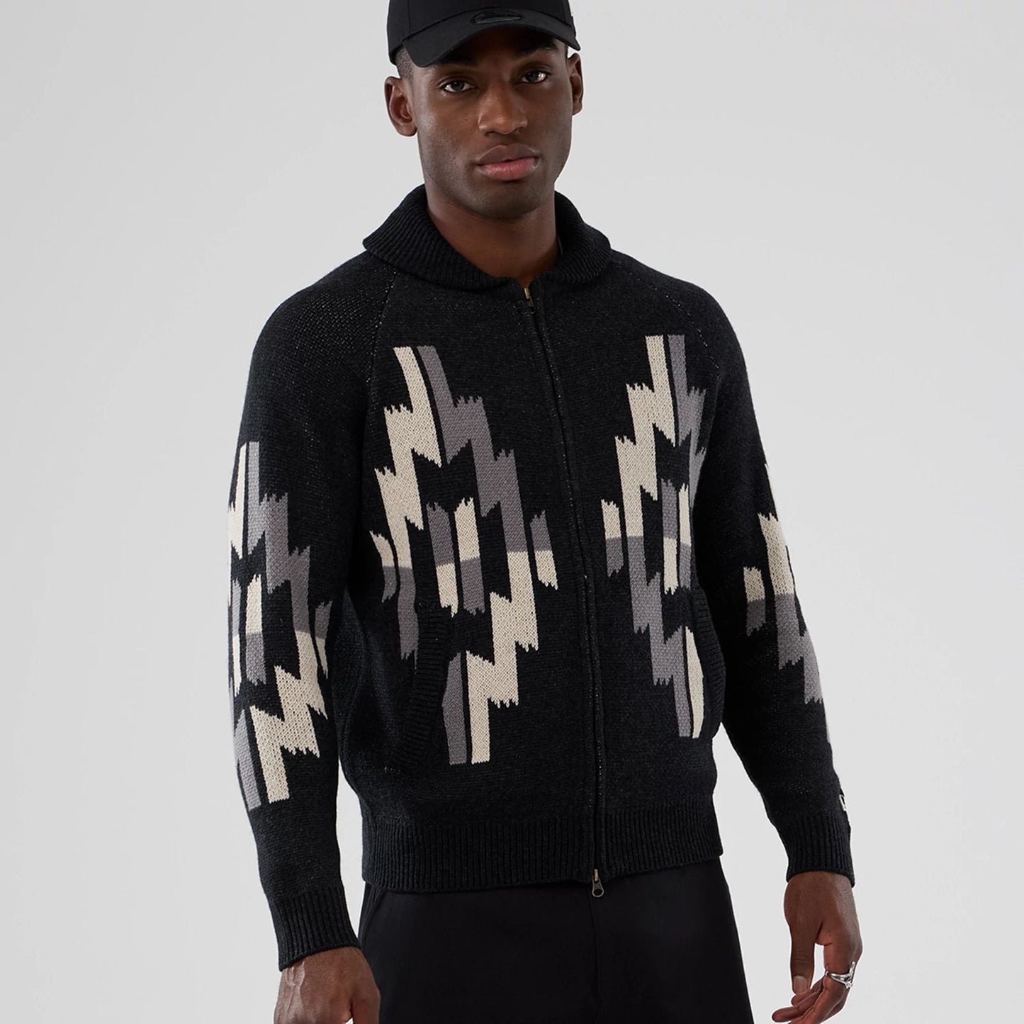 The Male model is wearing New Era Organic Cowichan Black Cardigan 7