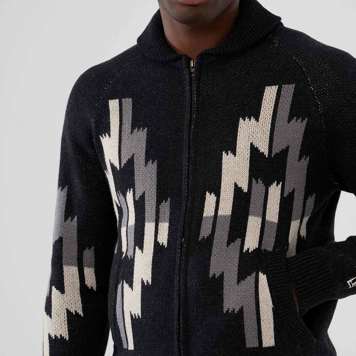 The Male model is wearing New Era Organic Cowichan Black Cardigan 3