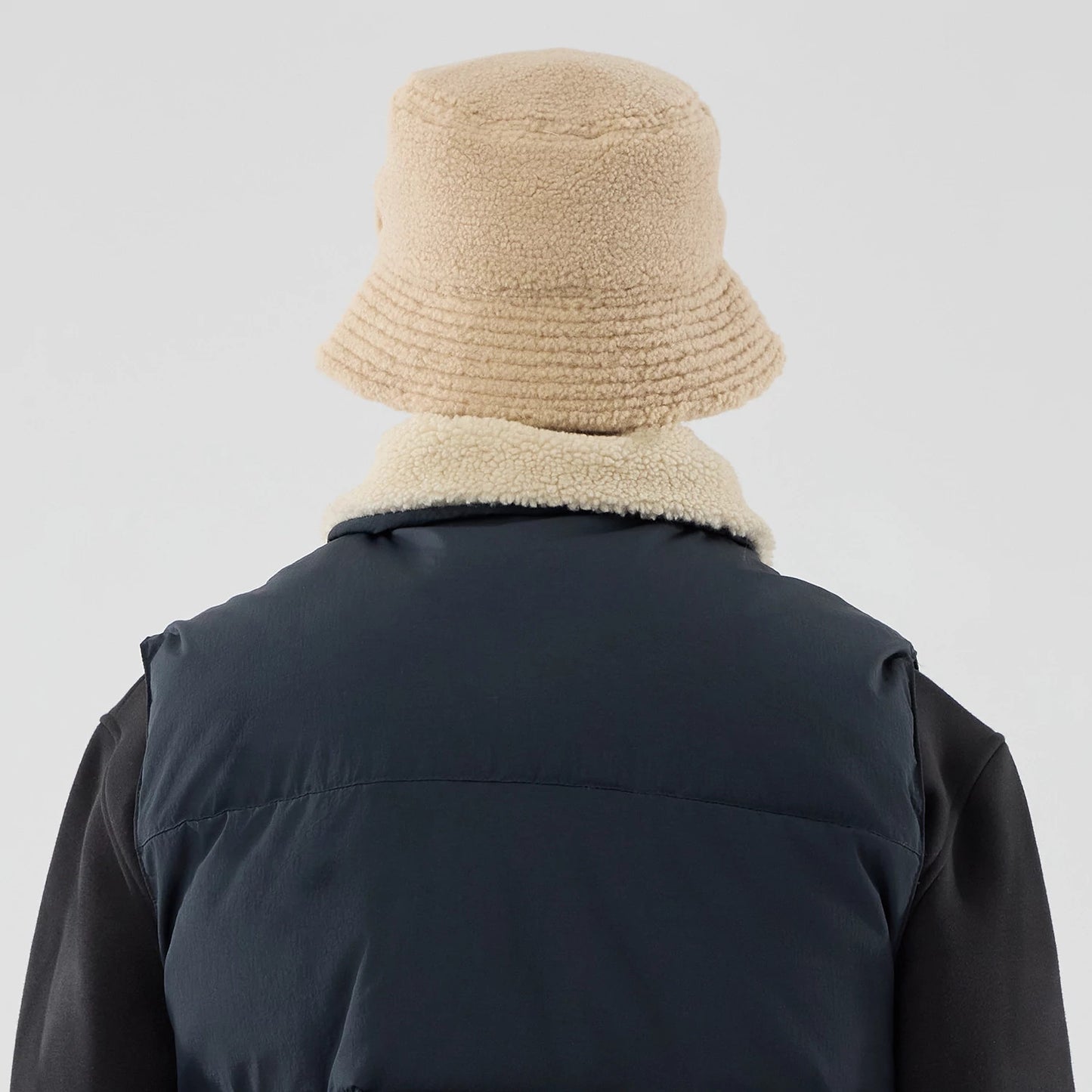 The Male model is wearing New Era Organic Boa Neck Navy Gilet 8