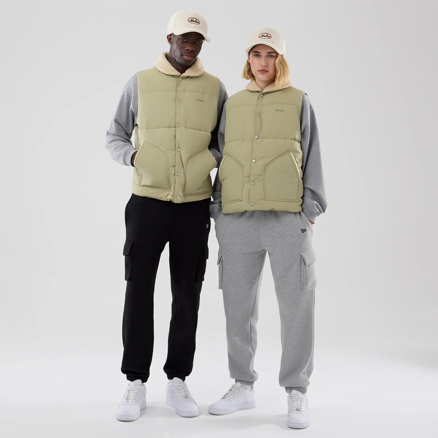 The Male model is wearing New Era Organic Boa Neck Khaki Gilet 1