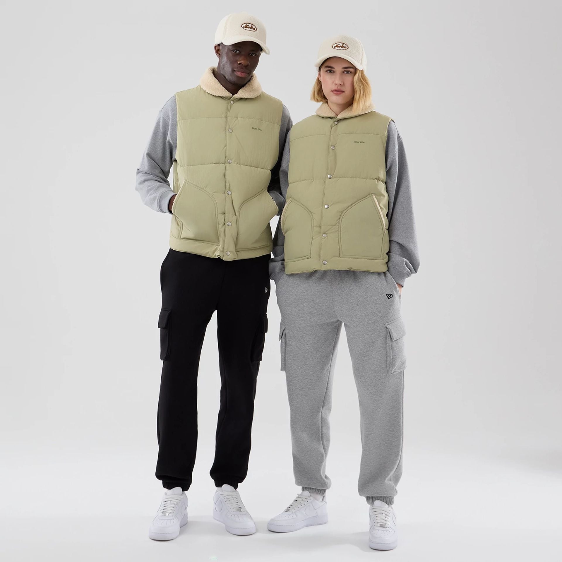 The Male model is wearing New Era Organic Boa Neck Khaki Gilet 1