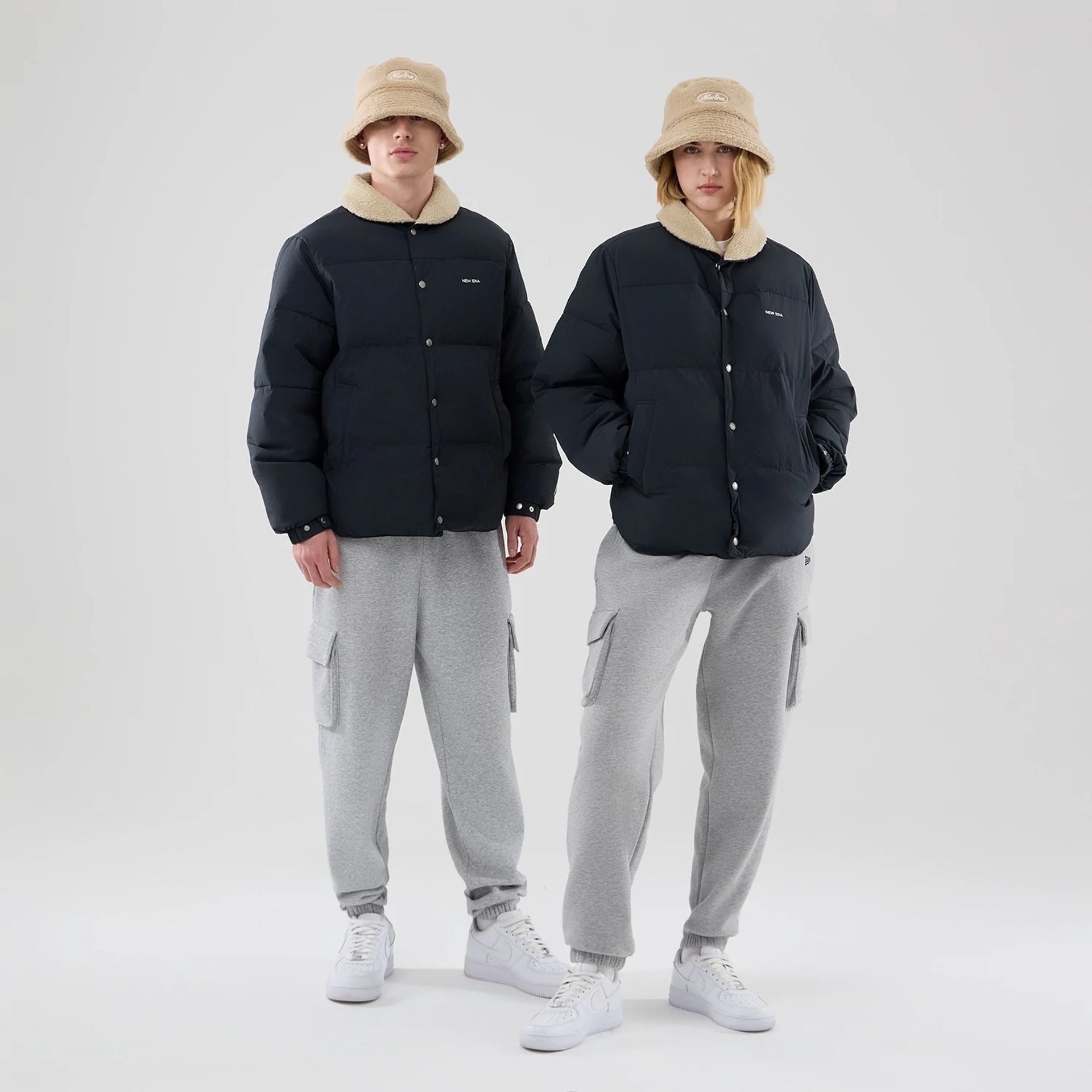 The Male model is wearing New Era Organic Boa Neck Navy Jacket 1