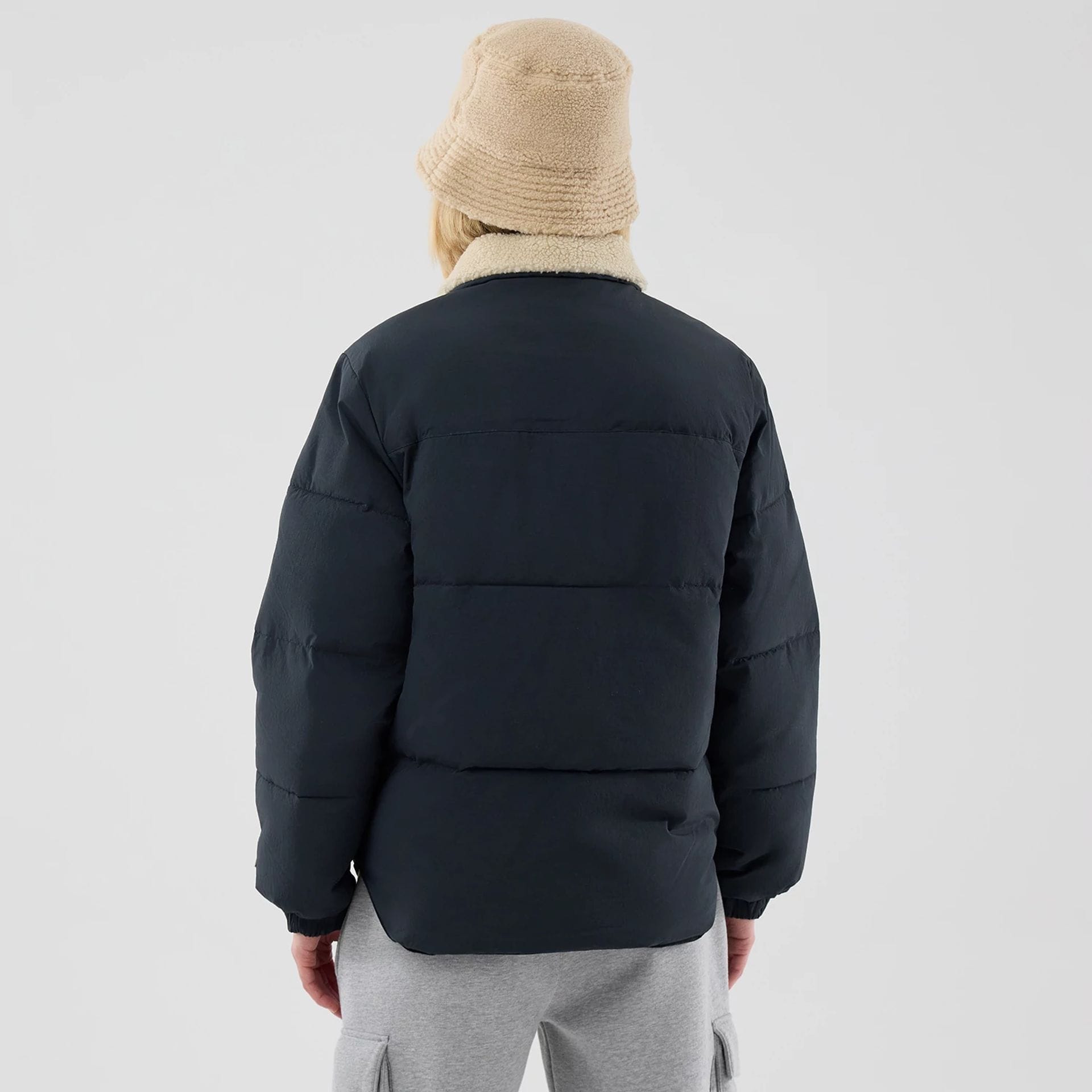 The Male model is wearing New Era Organic Boa Neck Navy Jacket 2