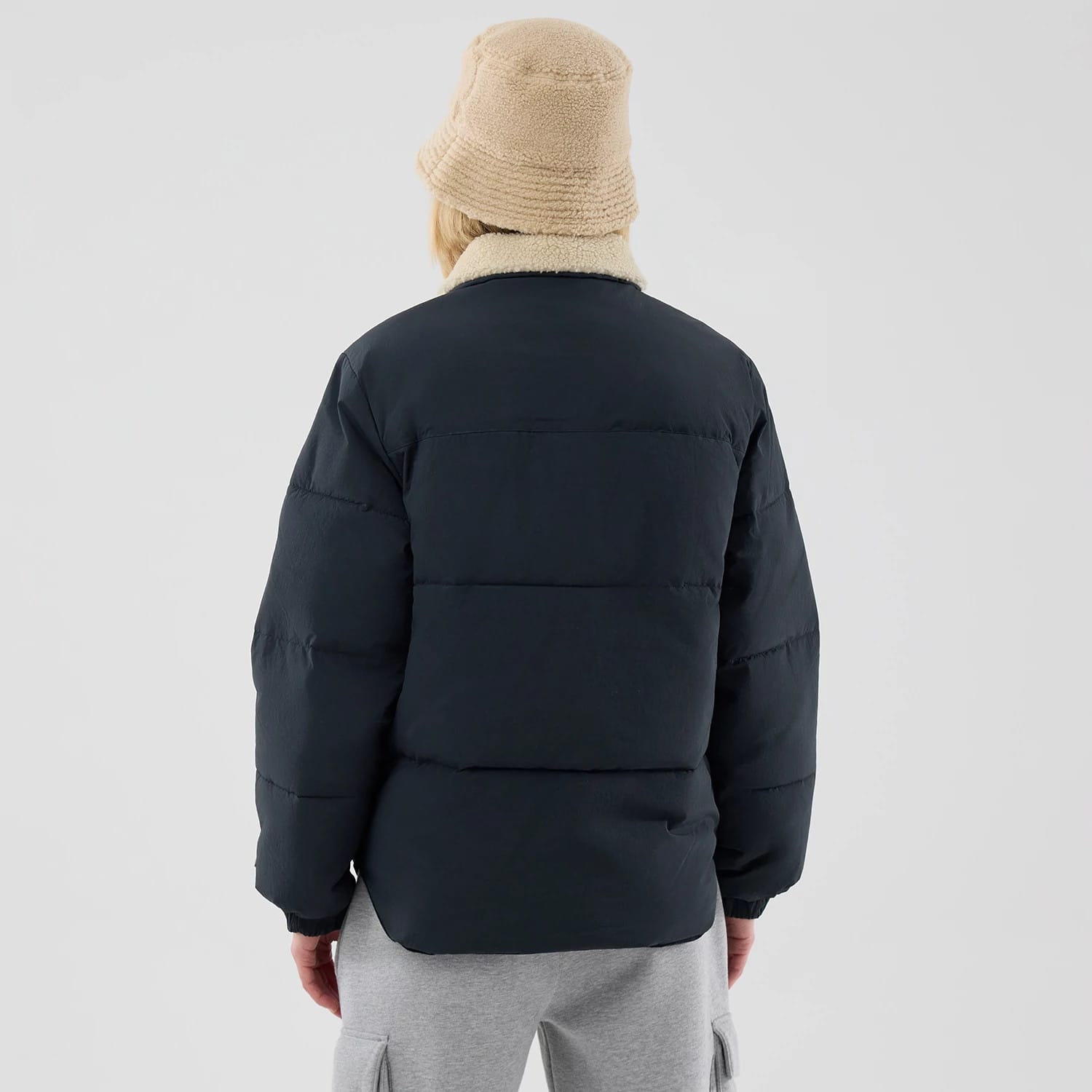 The Male model is wearing New Era Organic Boa Neck Navy Jacket 2