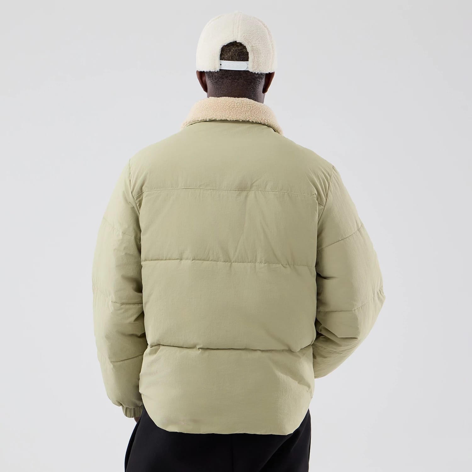 The Male model is wearing New Era Organic Boa Neck Khaki Jacket 2